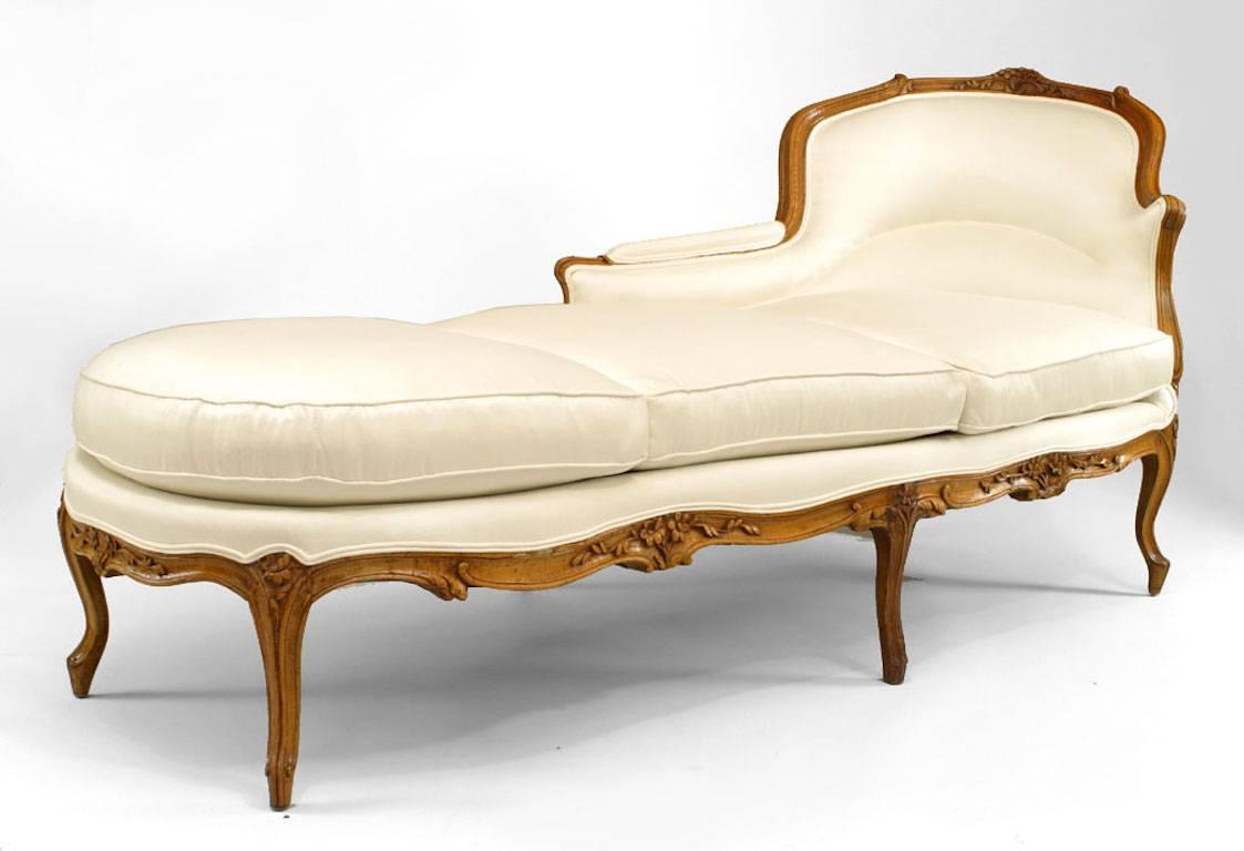 French Louis XV beechwood chaise lounge with floral carved trim and white upholstery with 3 cushions (right side)

