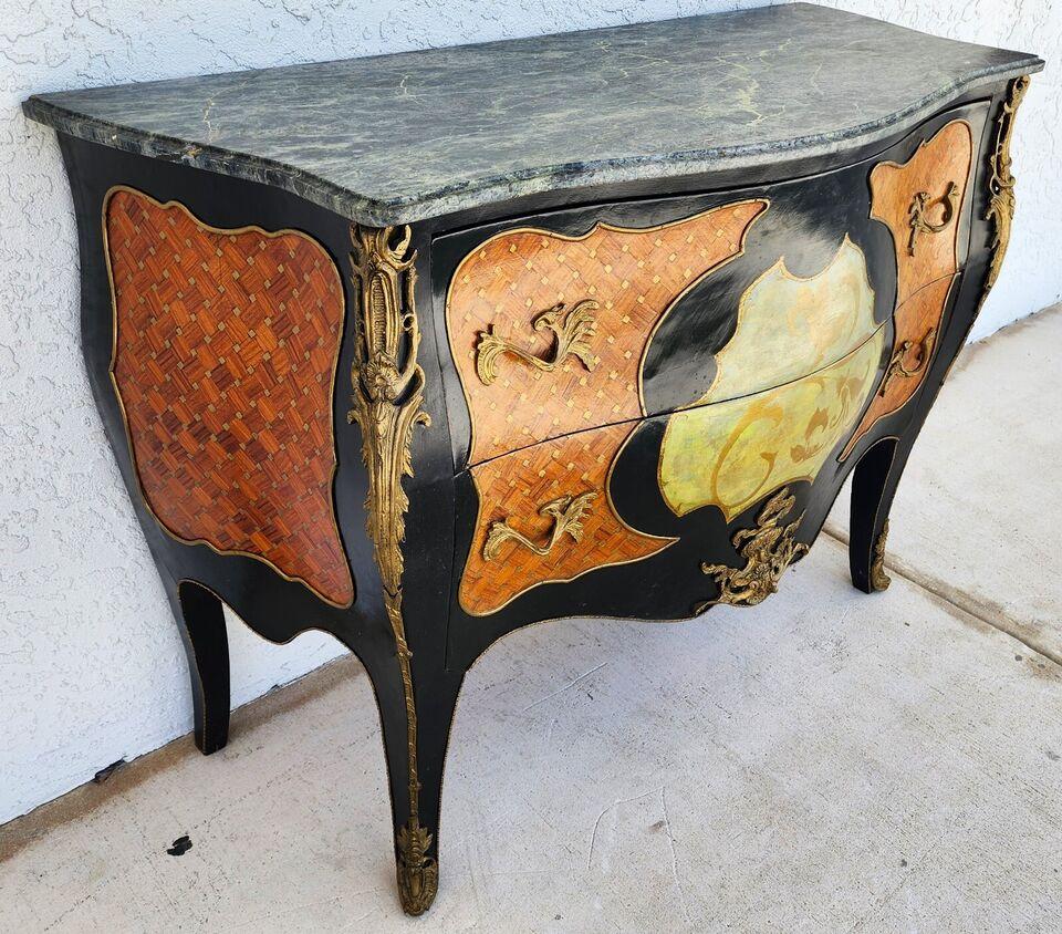 For FULL item description click on CONTINUE READING at the bottom of this page.

Offering One Of Our Recent Palm Beach Estate Fine Furniture Acquisitions Of A
French Louis XV Style Mahogany with Marble Top Commode Bombay Chest with Marquetry and