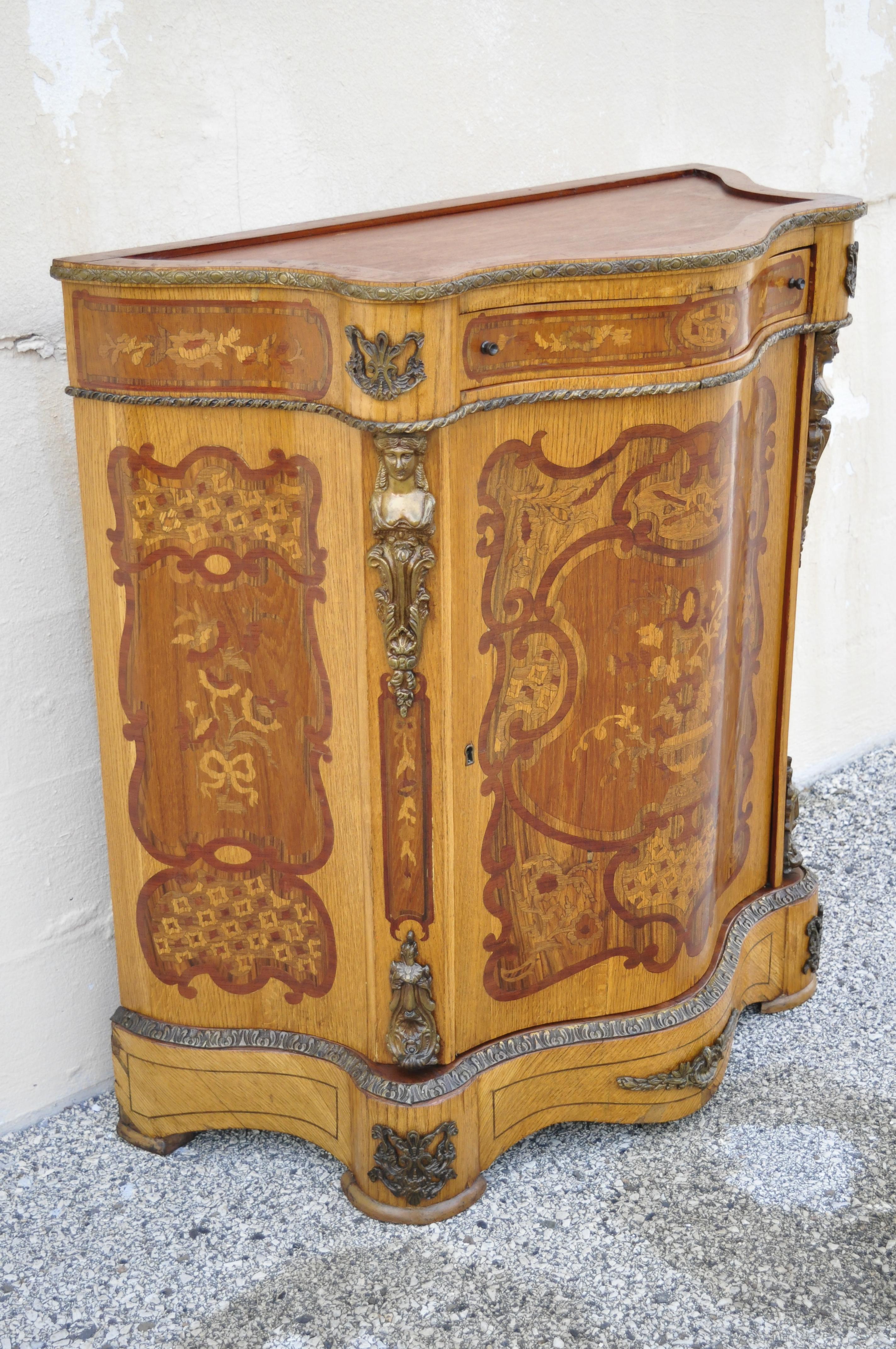 French Louis XV bronze ormolu satinwood inlay commode sideboard bombe cabinet. Item features bronze figural ormolu, nice inlay, 1 swing door, 1 drawer, great style and form, circa mid-late 20th century. Measurements: 39