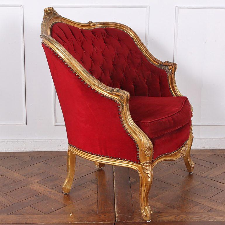 French carved and gilt Louis XV style armchair, circa 1930. Ornate and comfortable.



      