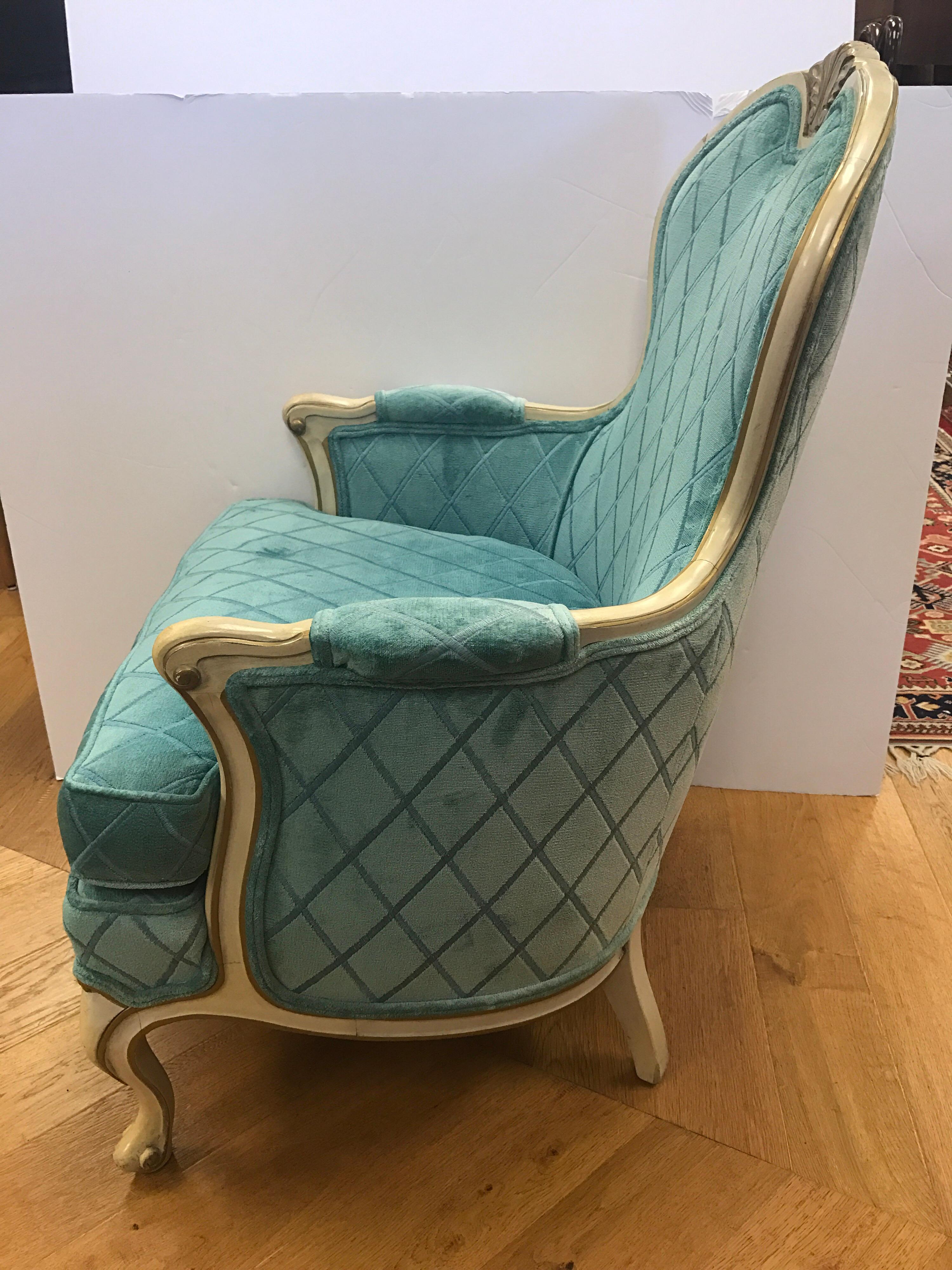 Stunning Louis XV bergère armchair with a wonderful turquoise fabric. All dimensions are below and seat height is 18 inches.