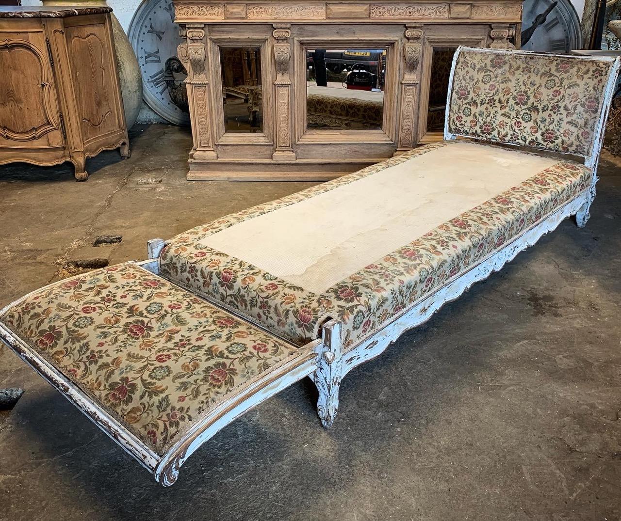 A beautiful French Louis XV daybed with lovely wood carvings. The frame and base are in good condition but needs new upholstery. Nice original chippy paint. 250 cm long with the end down.
Please contact us for a shipping quote.