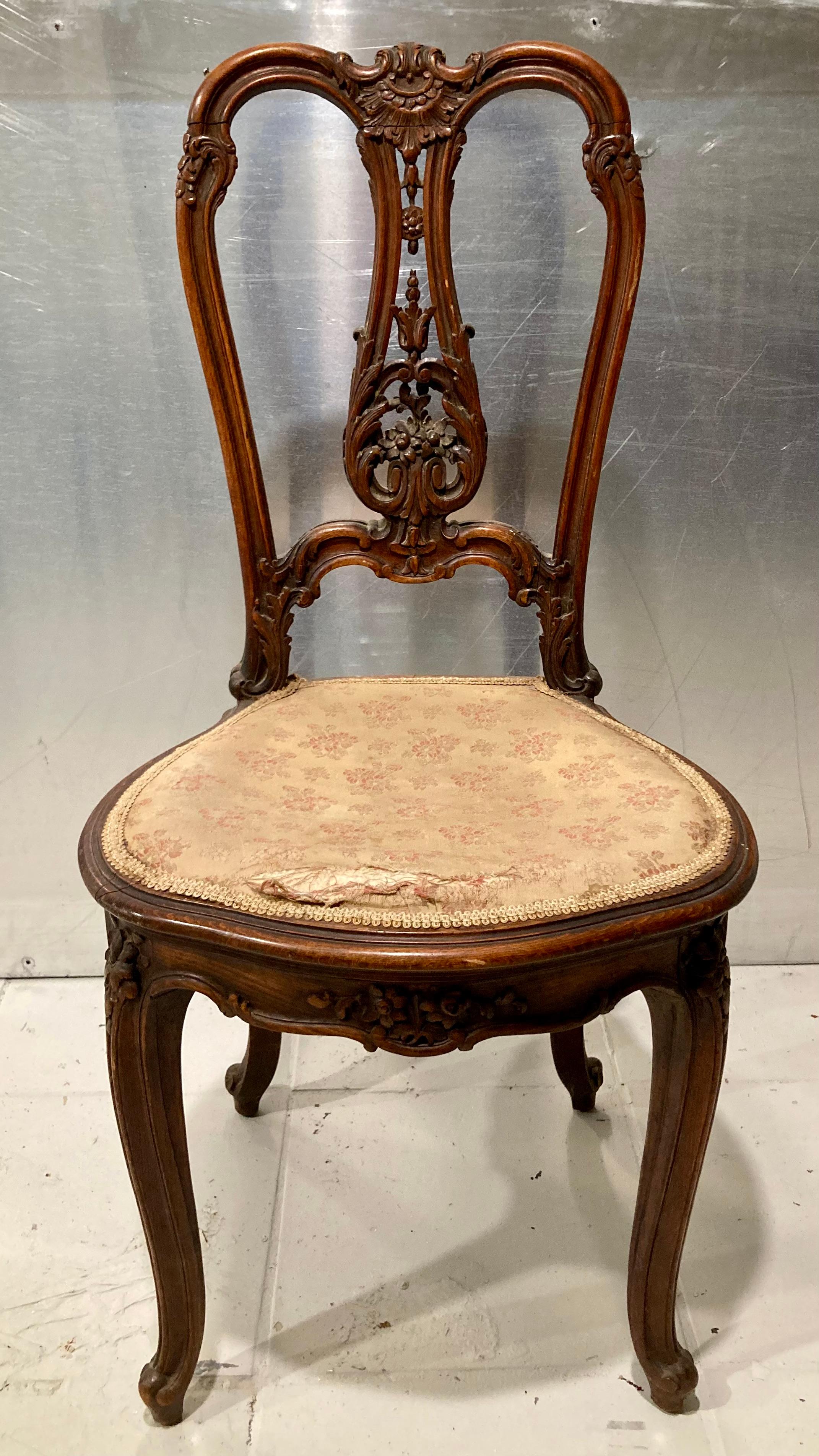Beautiful French Louis XV desk chair. Original frame finish and cushion seat. Beautiful original finish on frame and can easily be recovered in your favorite fabric.