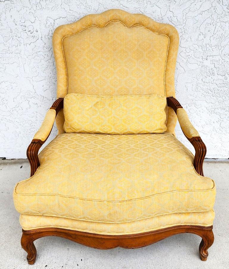 For FULL item description click on CONTINUE READING at the bottom of this page.

Offering one of our recent palm beach estate fine furniture acquisitions of a
French provincial Louis XV oversized Fauteuil armchair by Baker