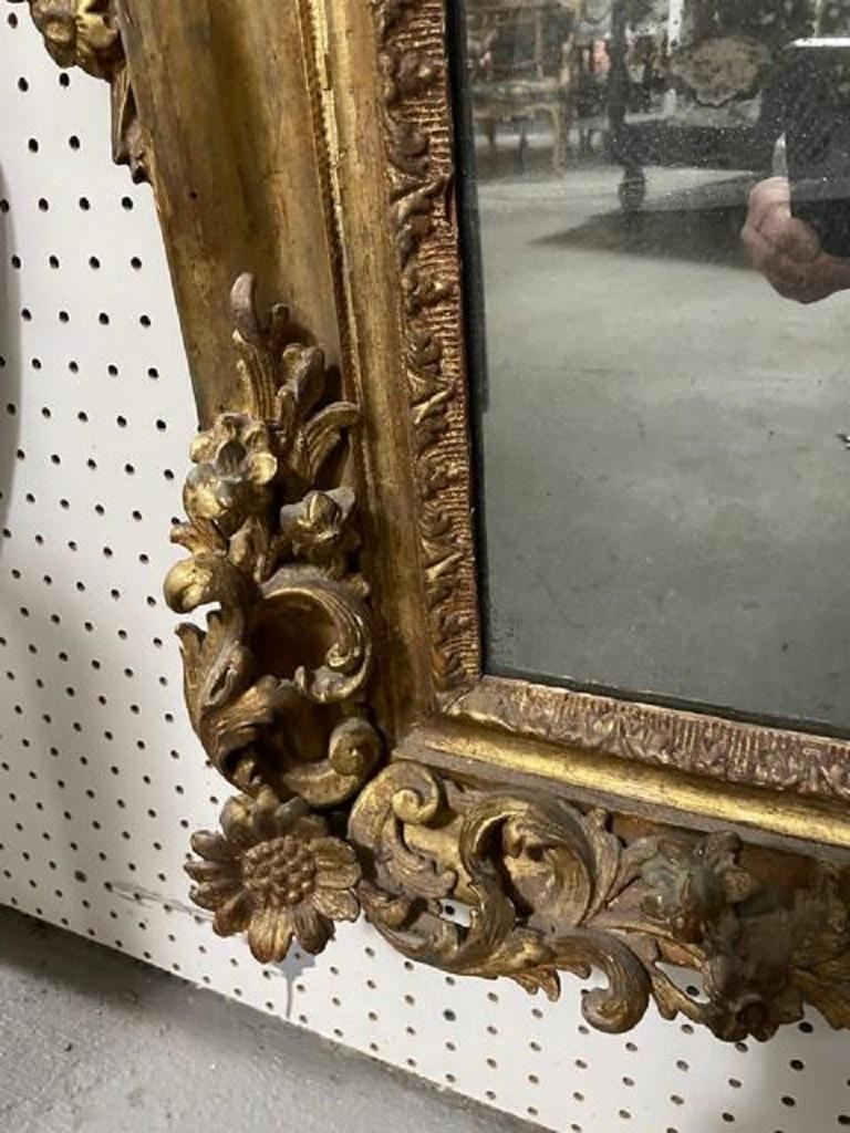 18th Century and Earlier French Louis XV Filigree Carved Giltwood Wall Mirror For Sale