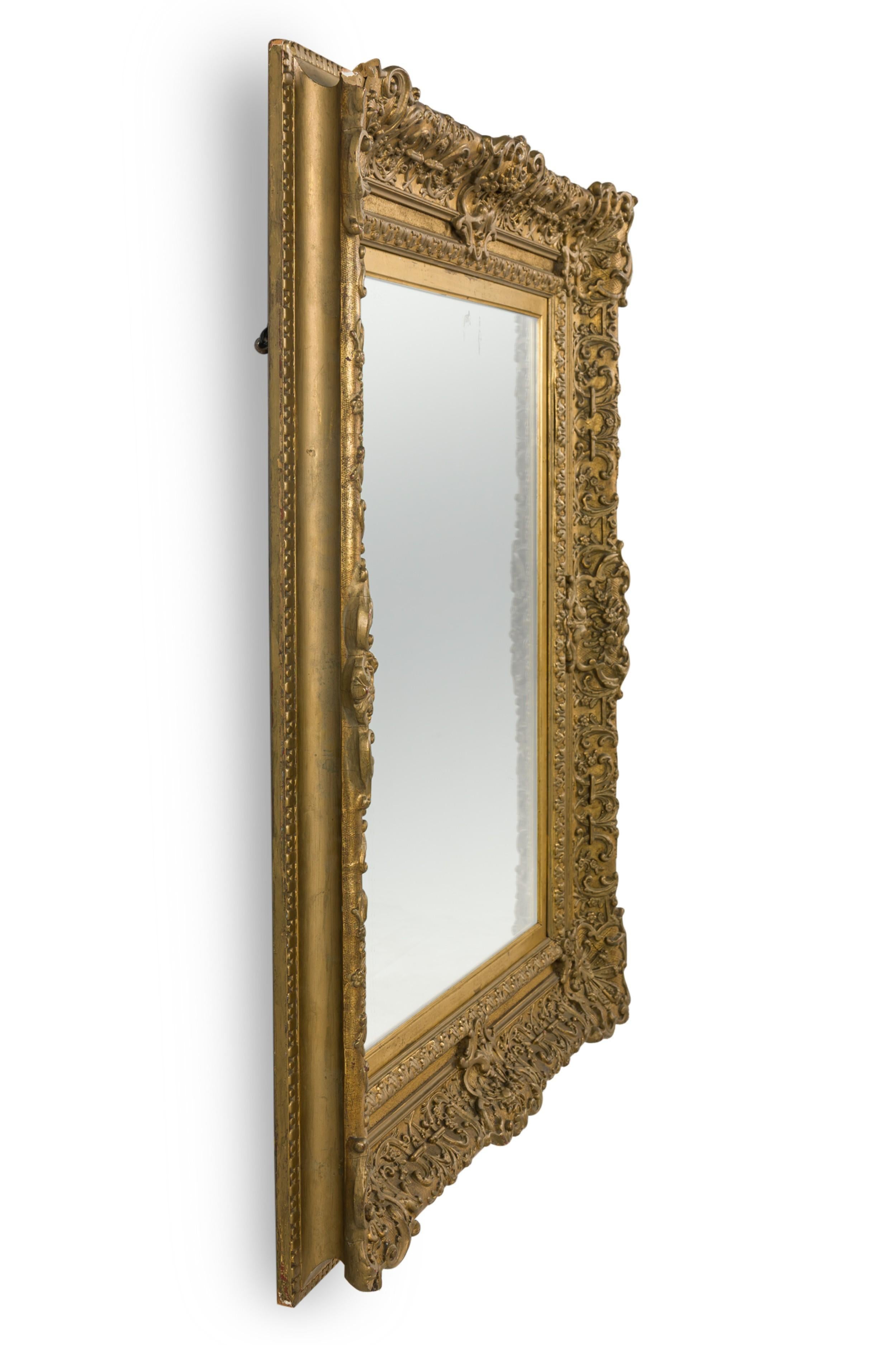 French Louis XV style (late19th Century) rectangular ornately carved mirror frame
 

 Condition: NO MIRROR
 Some minor losses to frame