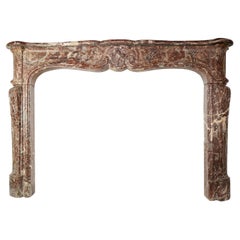 French Louis XV Hand Carved Rouge Royal Marble Mantel