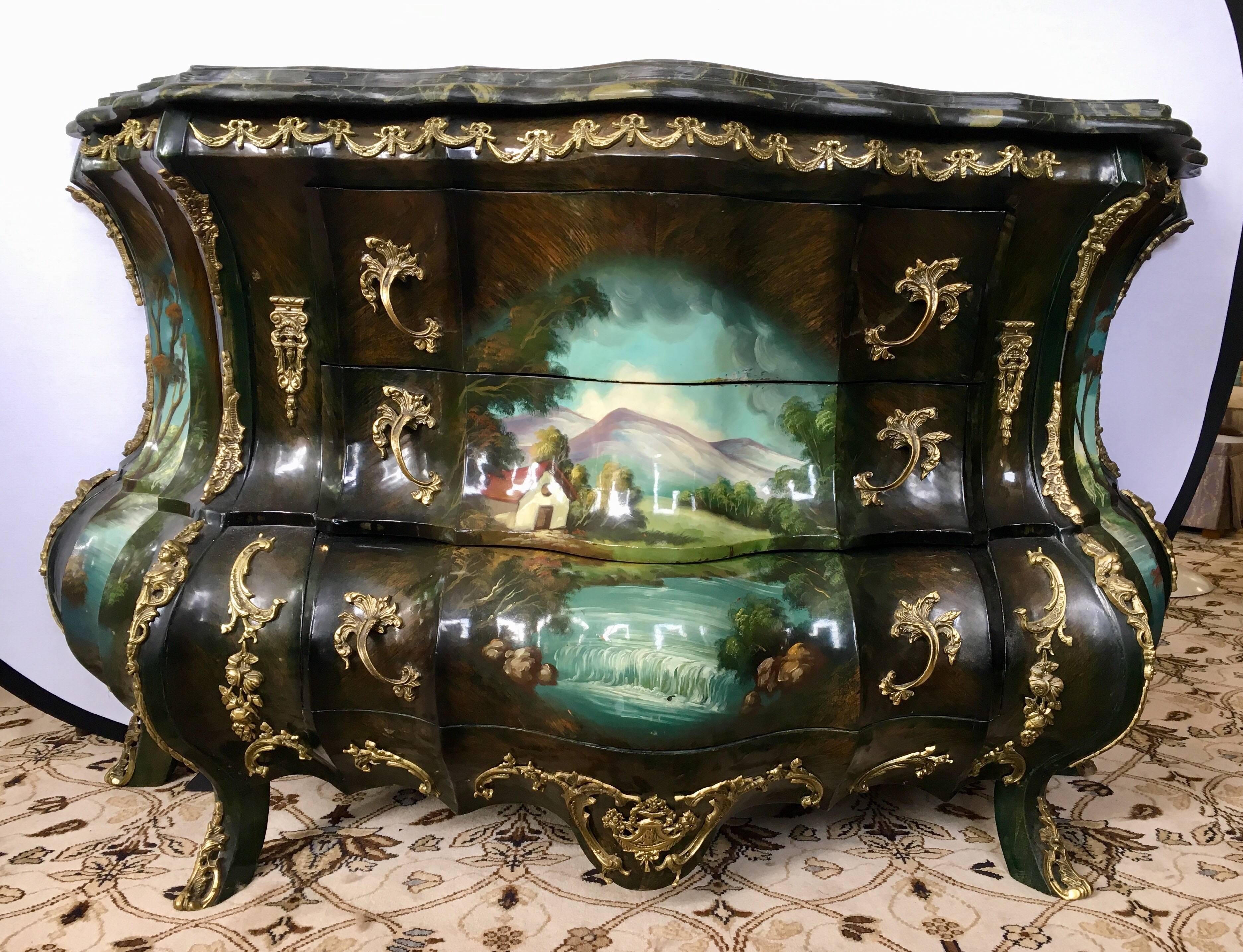 Magnificent, large Louis XV hand-painted bombe commode with marble top and intricate bronze mounts throughout. Truly one of a kind. Three drawers in all of differing sizes with artwork interlocking throughout.