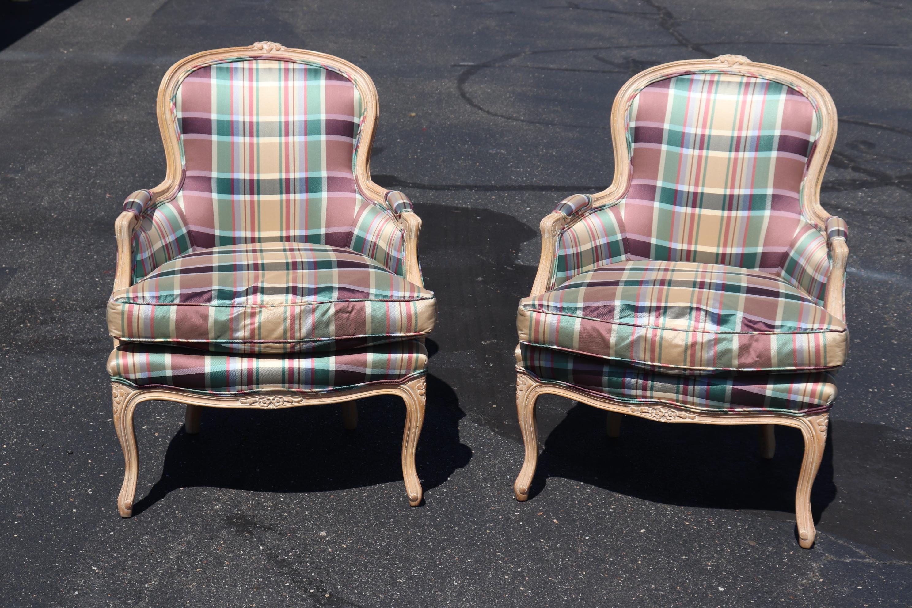 This is a gorgeous pair of plaid upholstered Louis XV Bereger chairs in upscale upholstery and featuring a limed walnut finish and the upholstery is very clean. The chairs measure 37 tall x 27 wide x 31 deep and the seat height of 20 inches. They