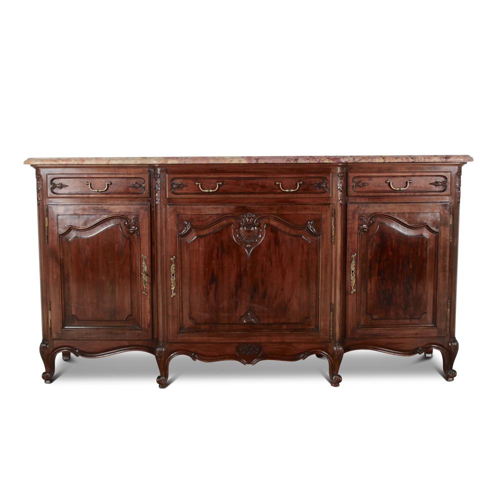 Lovely quality French cherry breakfront Louis XV style buffet having three drawers above three doors, and carved throughout.
Original marble top with complex shaped edge.

 