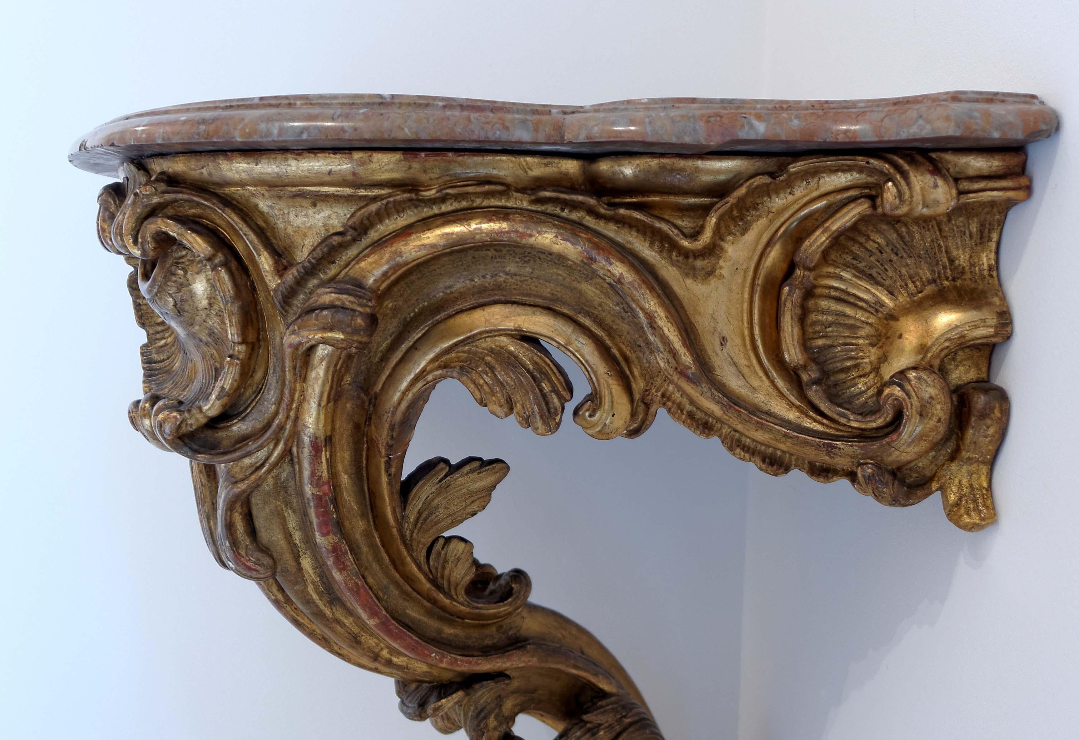 Carved French Louis XV, Mid-18th Century Giltwood Corner Console For Sale