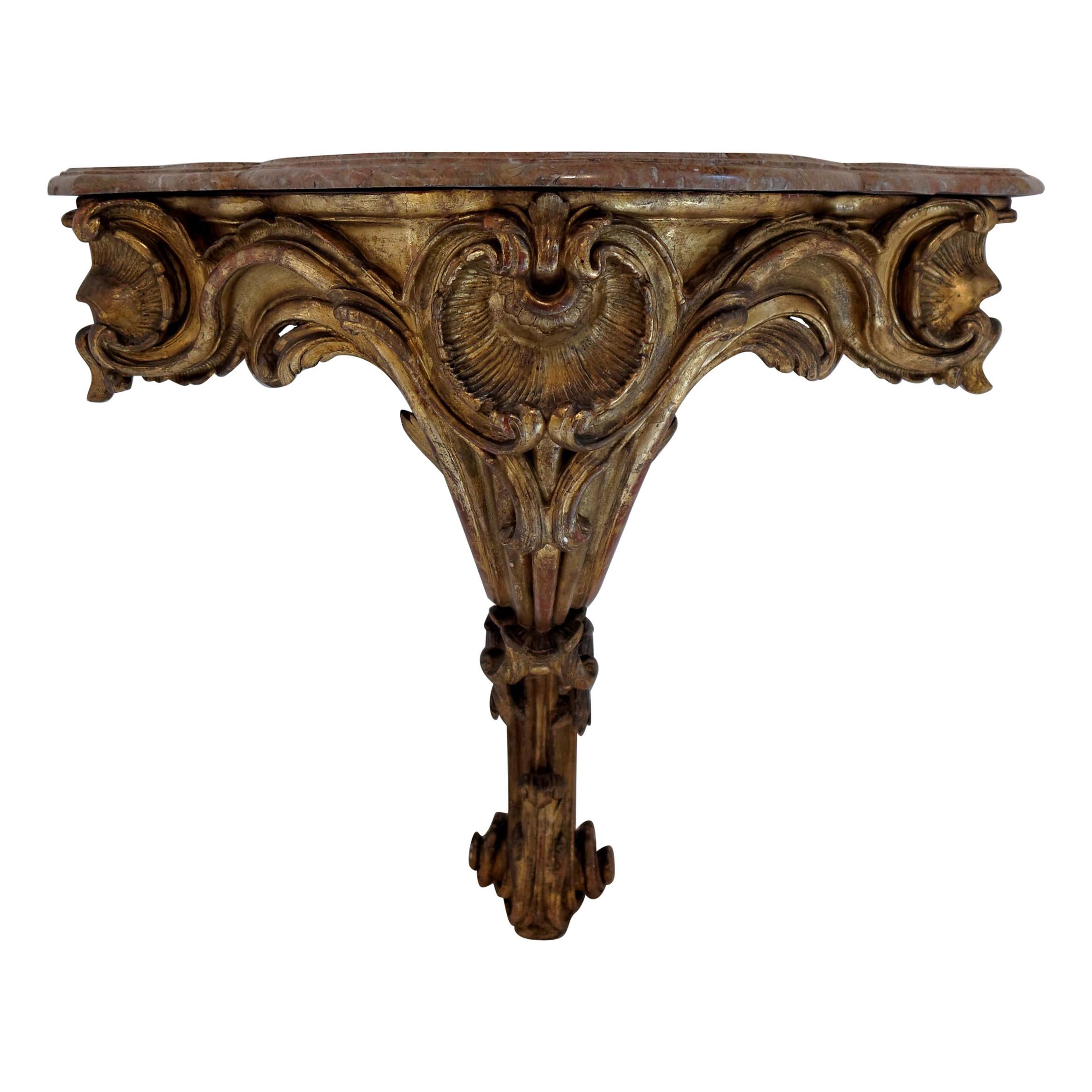 French Louis XV, Mid-18th Century Giltwood Corner Console For Sale