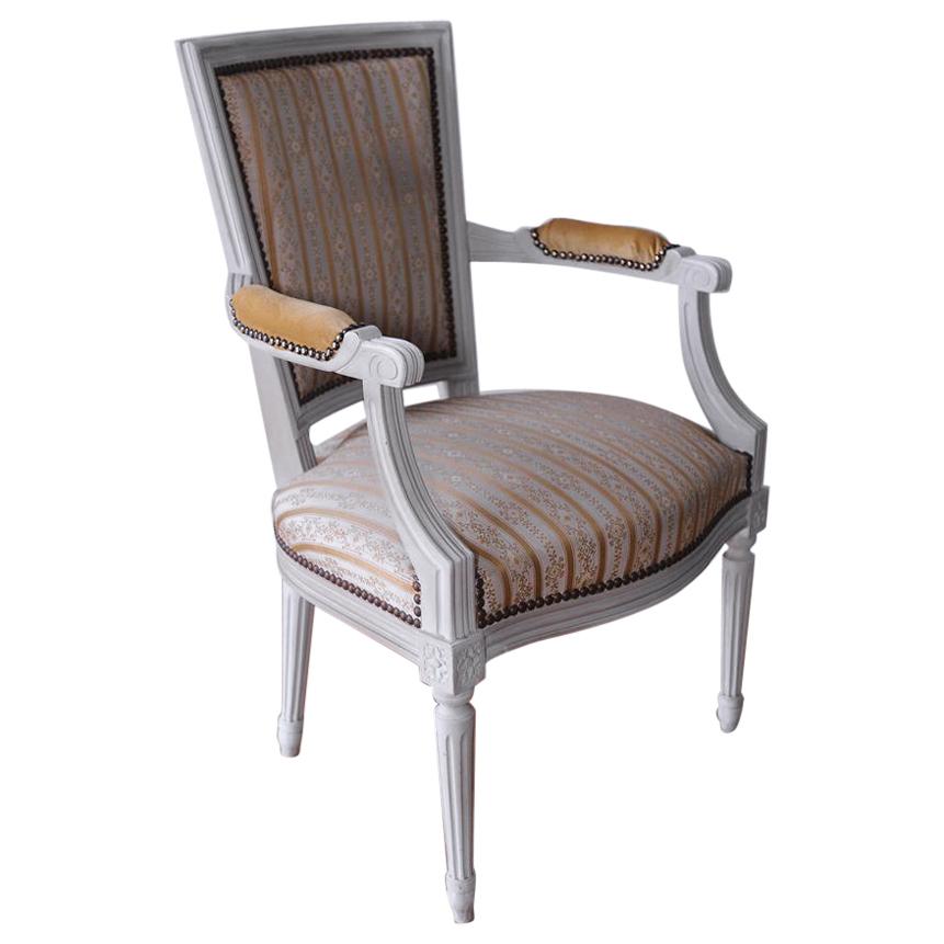 French Louis XV, Neoclassical Bergère Armchair with Moulded Motifs, Gilt Studs For Sale