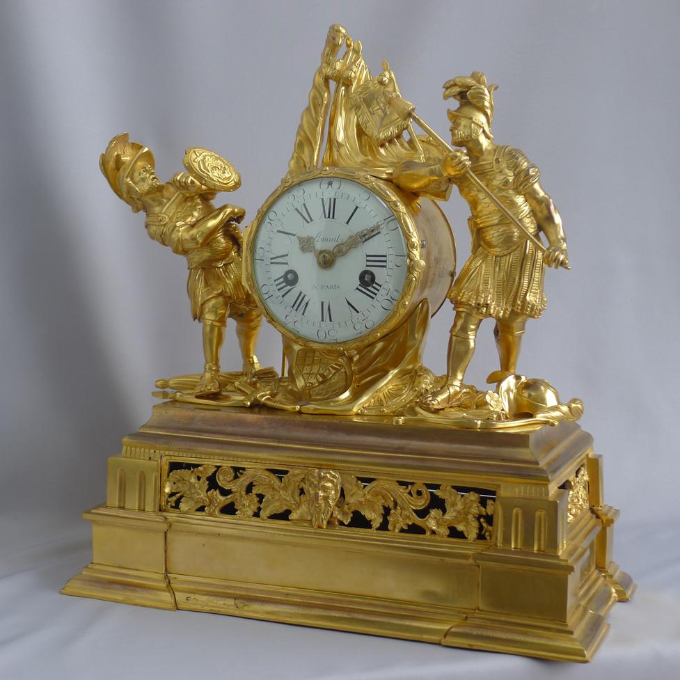 Are antique French Louis XV ormolu mantel clock of Hannibal and Scipio signed Amant. This rare and unusual clock, in extremely fine condition and entirely original fire gilt ormolu, shows the two famous generals, Hannibal and Scipio, whose deeds