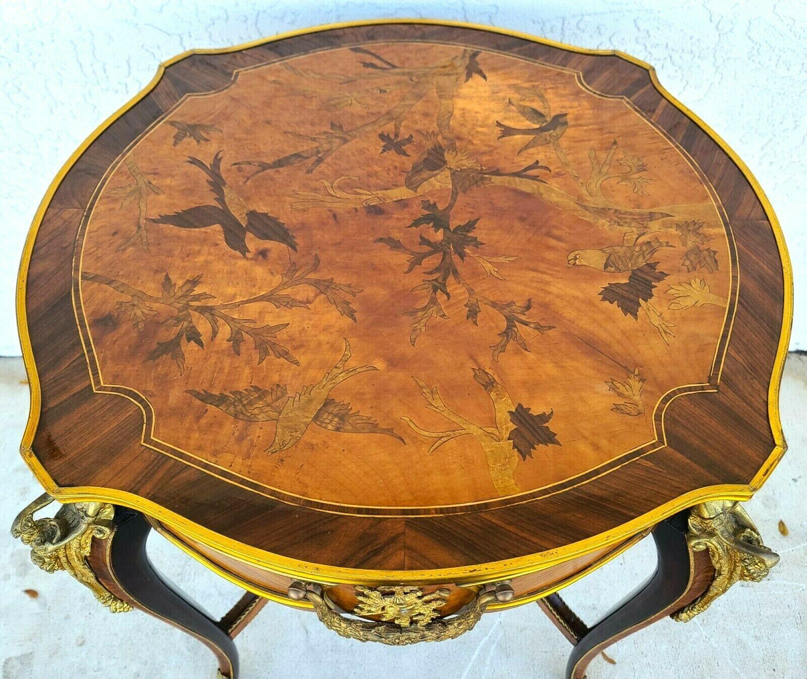 For FULL item description be sure to click on CONTINUE READING at the bottom of this listing.

Offering One Of Our Recent Palm Beach Estate Fine Furniture Acquisitions Of A 
LOUIS XV ORMOLU MOUNTED & INLAID MARQUETRY OCCASIONAL Table 
Featuring