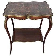 Table française Louis XV en cuir de style chinoiserie montée en bronze doré
