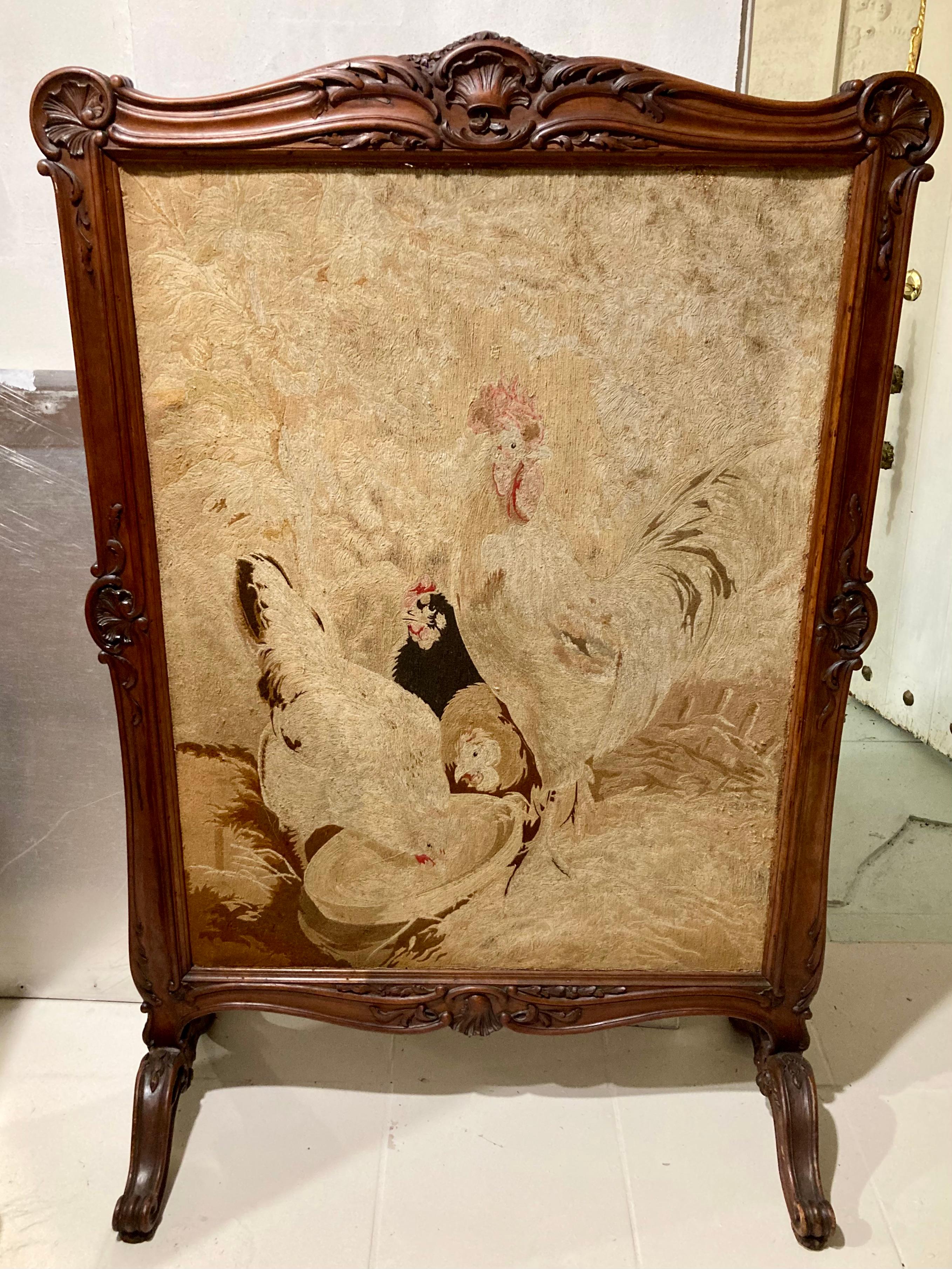 Beautiful French Louis XV palace size fire screen with embroidered rooster and hen motif. Amazing scale and hand carved wood details. Original finish and original textiles. Beautiful embroidery work. Add some French style to your home.