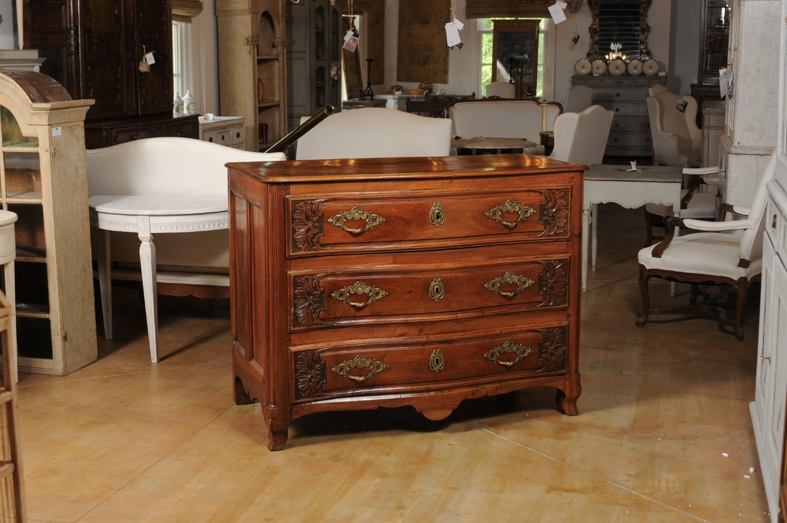 Carved French Louis XV Period 1730s Walnut Three-Drawer Commode from Lyon with Foliage For Sale