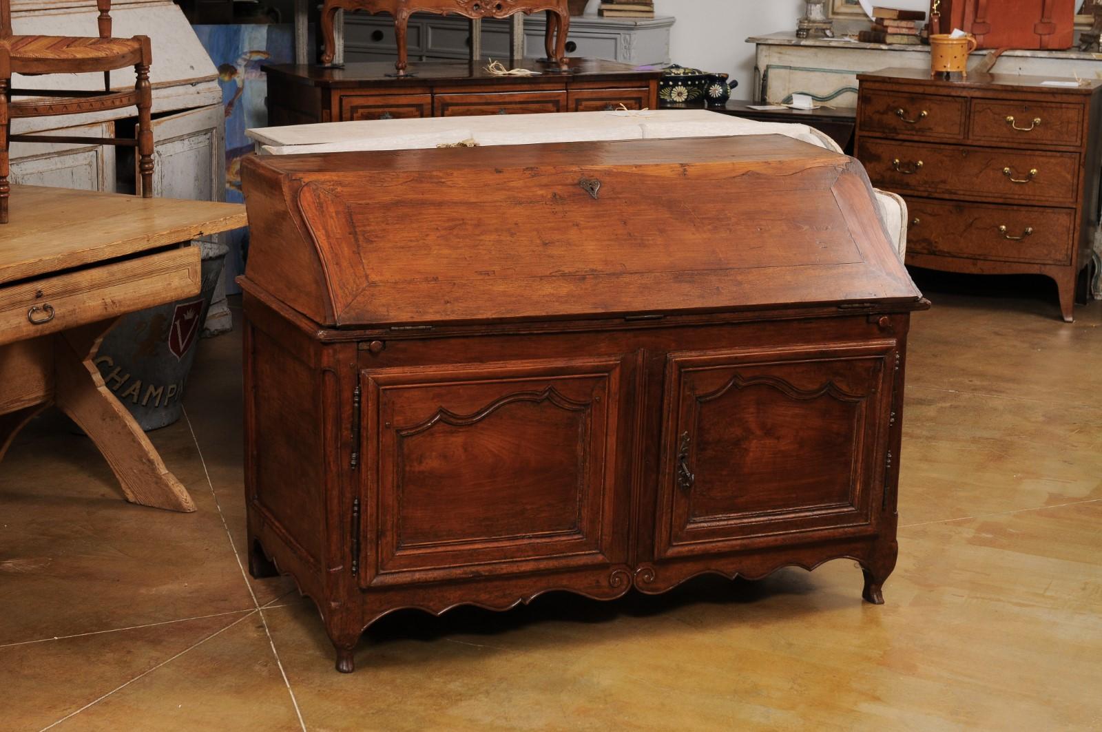 Carved French Louis XV Period 18th Century Walnut Slant Front Secretary and Buffet For Sale