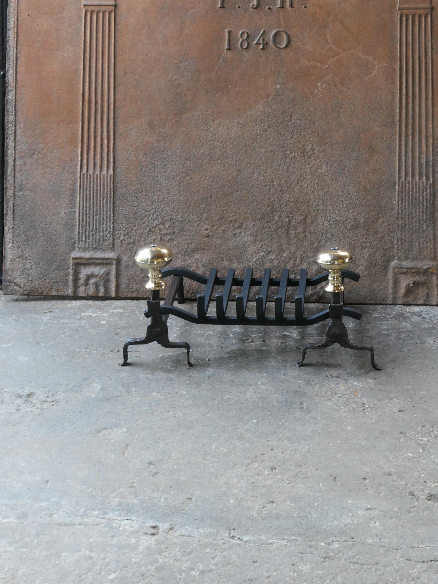 18th century Dutch Louis XV period fire grate. Made of beautifully forged wrought iron and bronze. The condition is good.





  