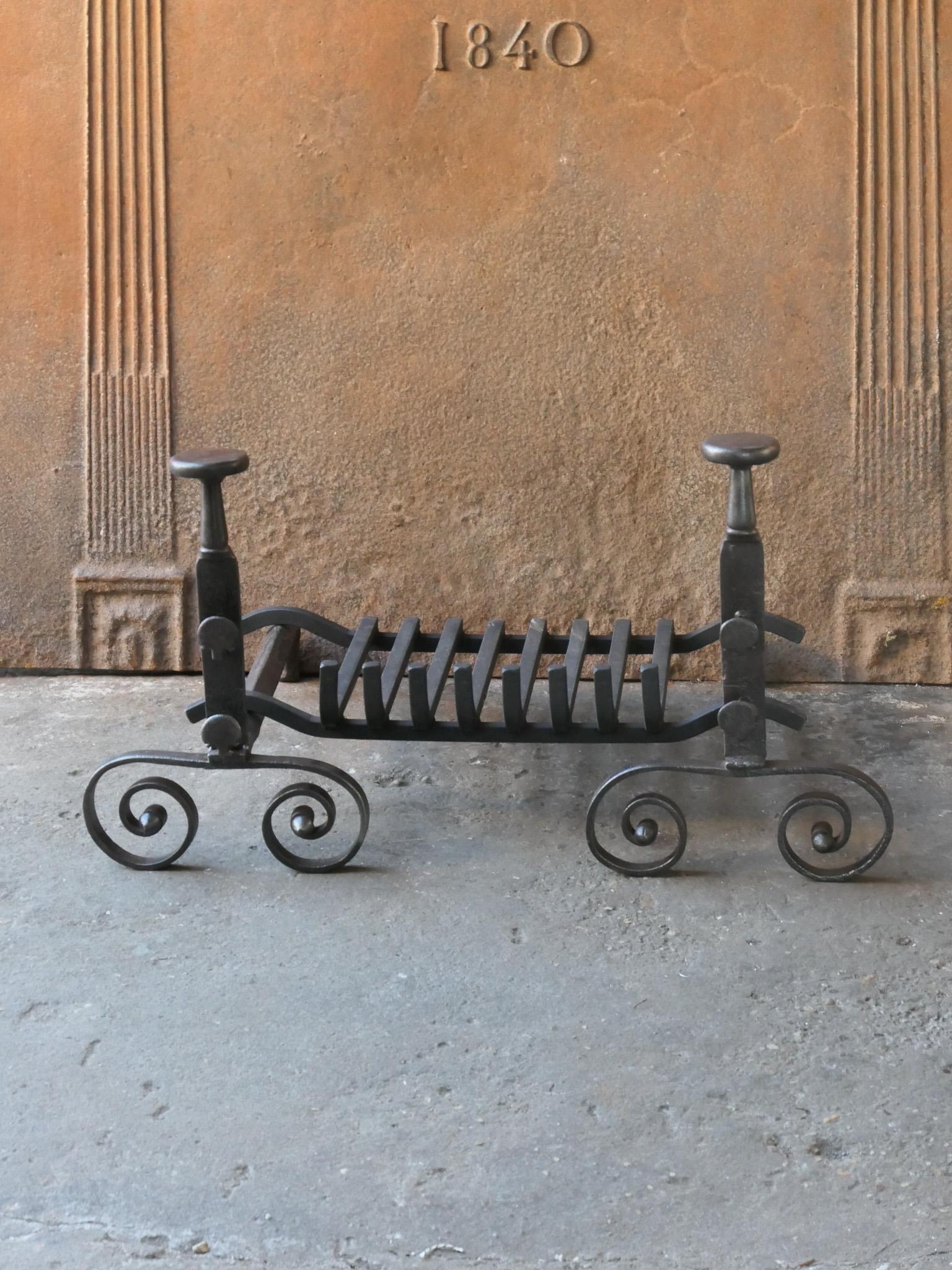 18th century French Louis XV period fire grate made of wrought iron. The condition is good.

Width at front is 68.5 cm (27.0 inches).




  
