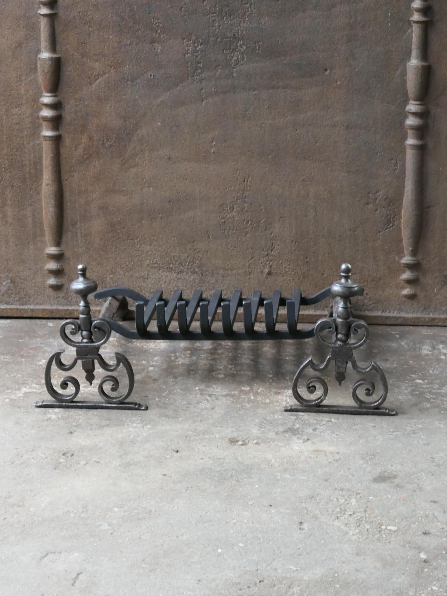 18th century French Louis XV period andirons made of wrought iron with a recently forged grate. The condition is good.




  
