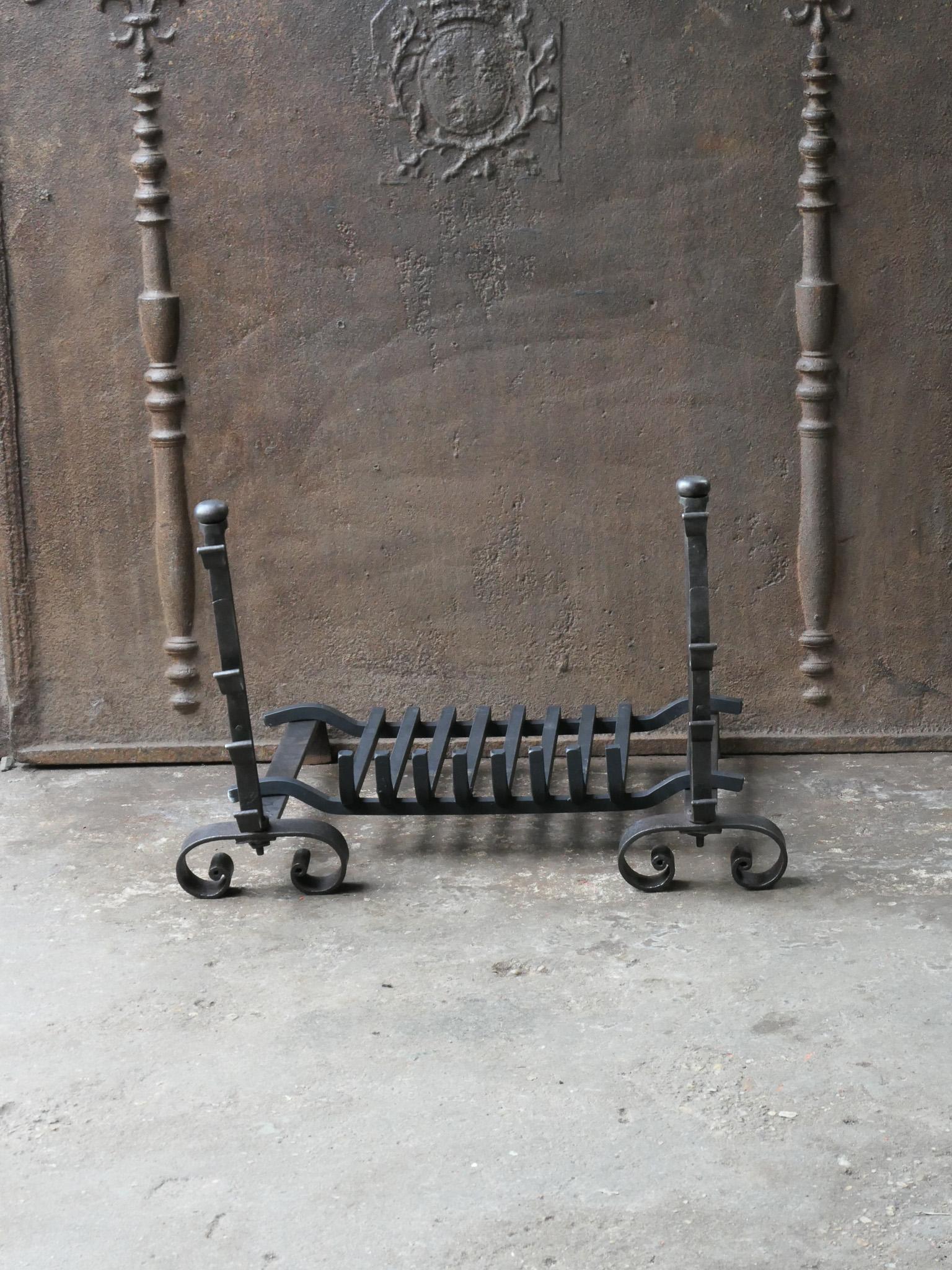 18th century French Louis XV period andirons made of wrought iron with a recently forged grate. The condition is good.




  