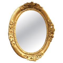 French Louis XV Period Oval Mirror in Carved and Gilded Wood, Circa 1750