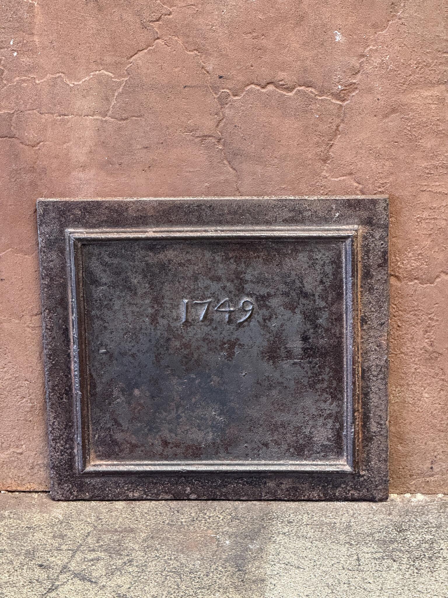 18th Century French Louis XV Period Fireback / Backsplash, Dated 1749

The fireback is made of cast iron and has a brown patina. Upon request, it can be made black/pewter at no extra cost. It is in good condition and does not have cracks.