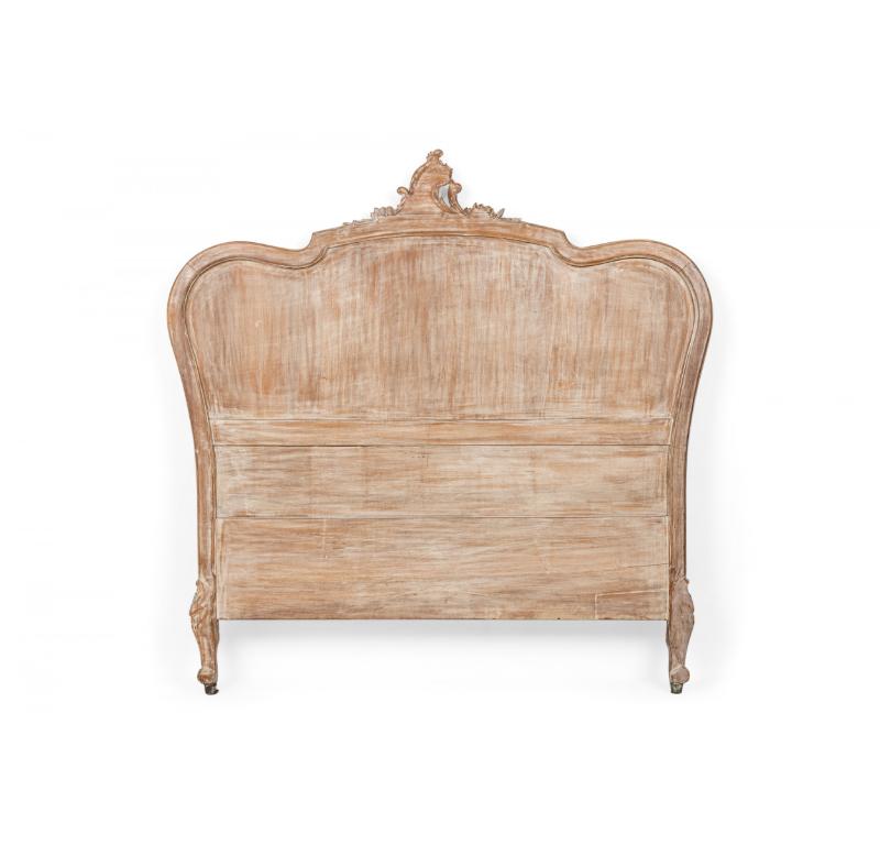 French Louis XV Provincial-style (19/20th Century) bleached full size bed. (Includes: headboard, footboard, and rails)