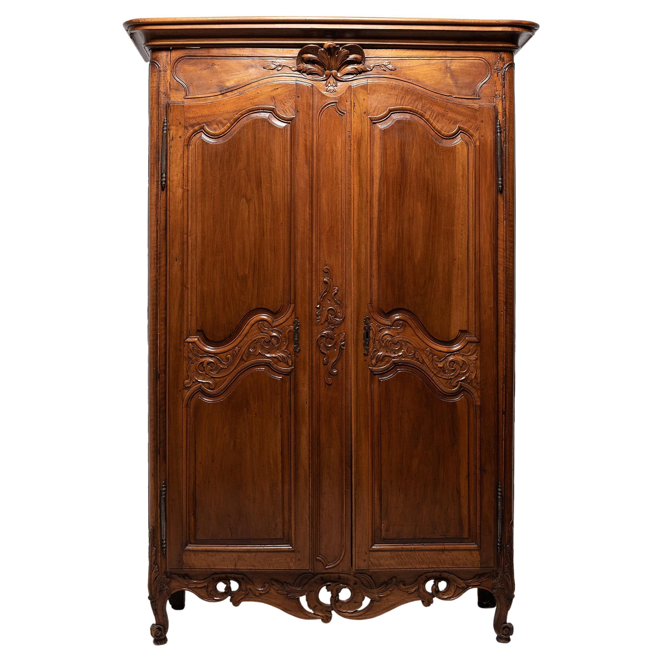 French Louis XV Provincial Fruitwood Armoire, c. 1800