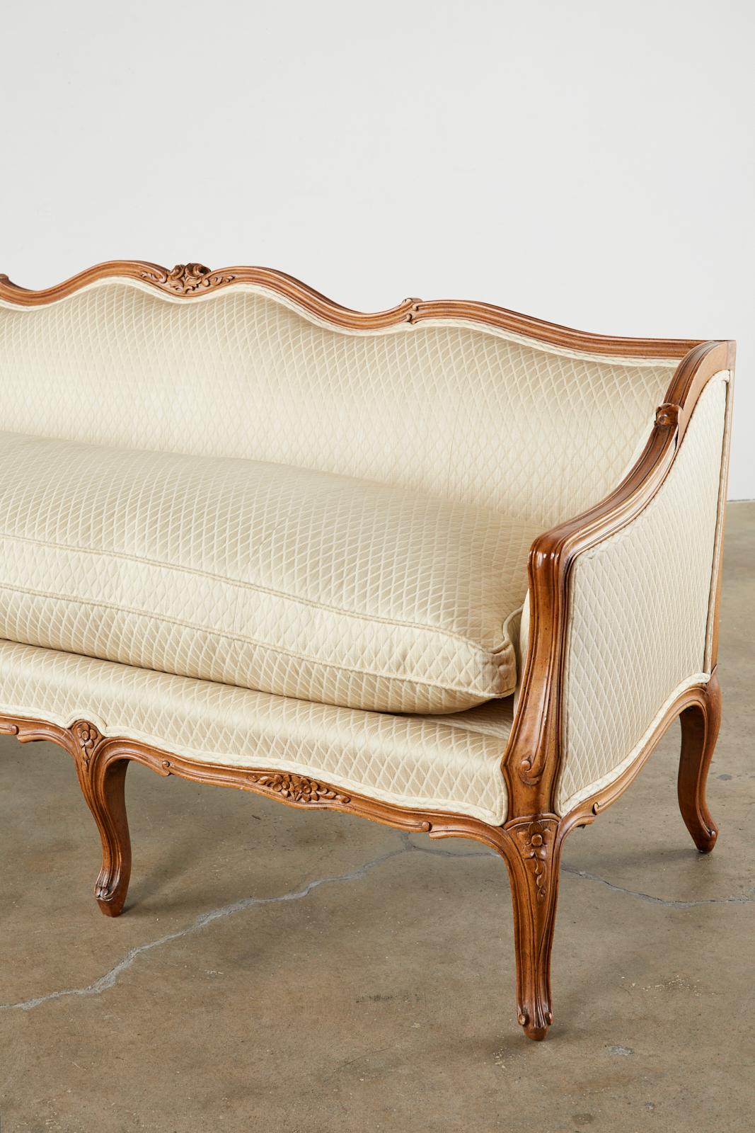 Hand-Crafted French Louis XV Provincial Style Carved Serpentine Sofa