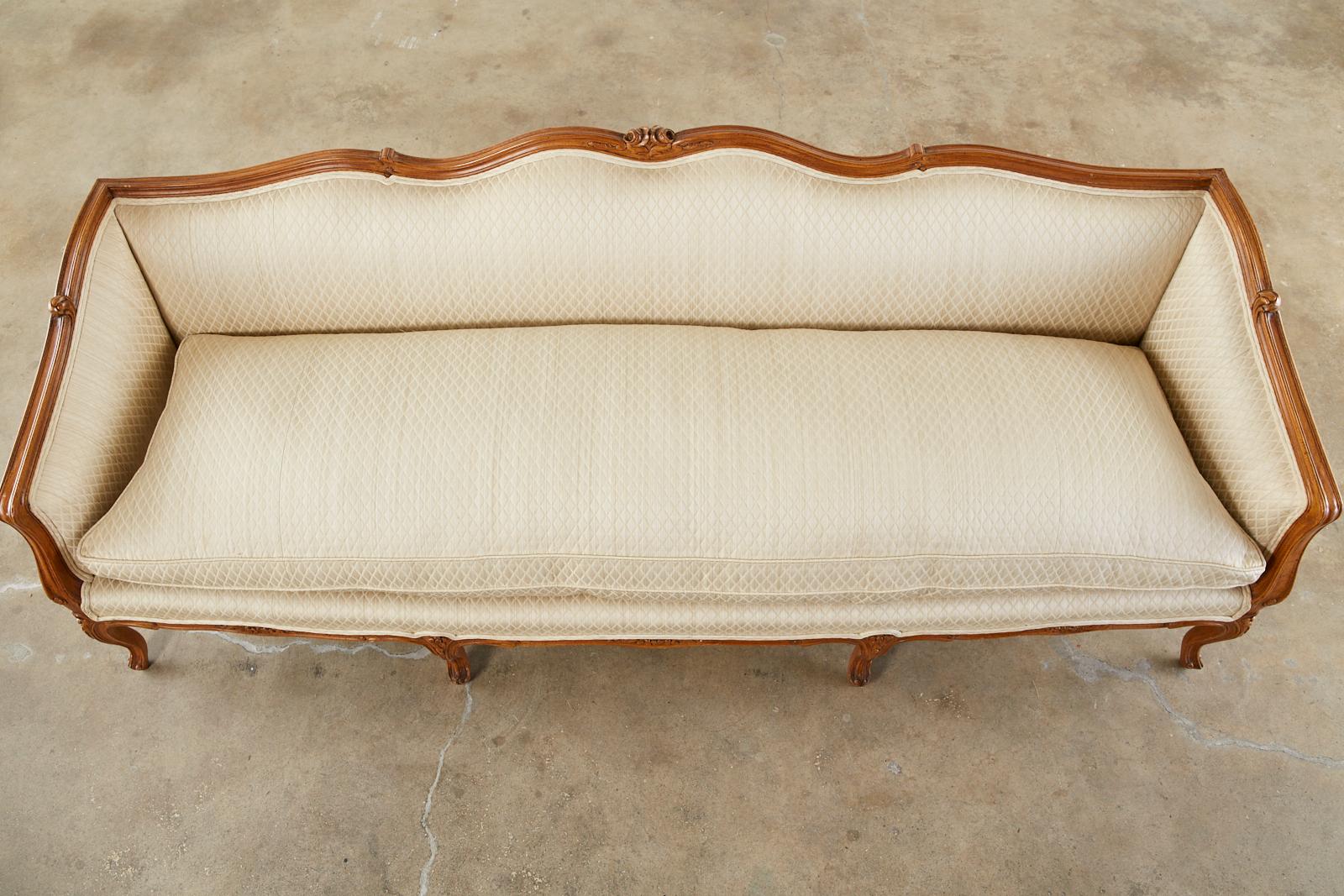 20th Century French Louis XV Provincial Style Carved Serpentine Sofa