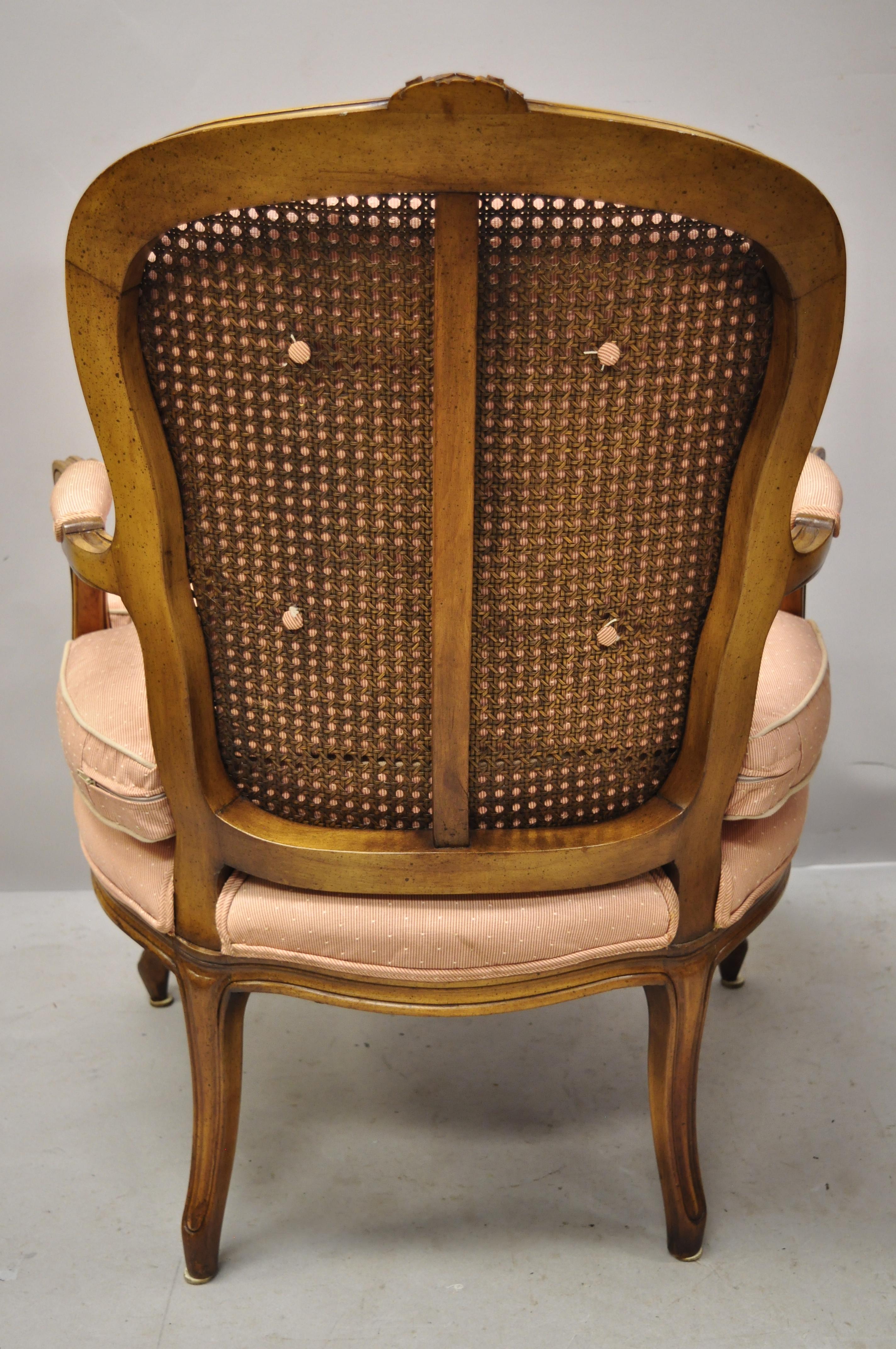 French Louis XV Provincial Style Carved Walnut Cane Back Armchairs, a Pair In Good Condition For Sale In Philadelphia, PA