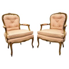 French Louis XV Provincial Style Carved Walnut Cane Back Arm Chairs - a Pair