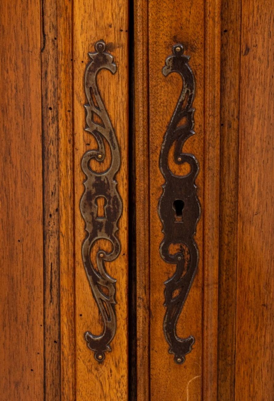 French Louis XV provincial style carved oak corner cupboard or encoignure, one curved paneled door, raised on cabriole feet, French maker plate to back.

Dealer: S138XX.