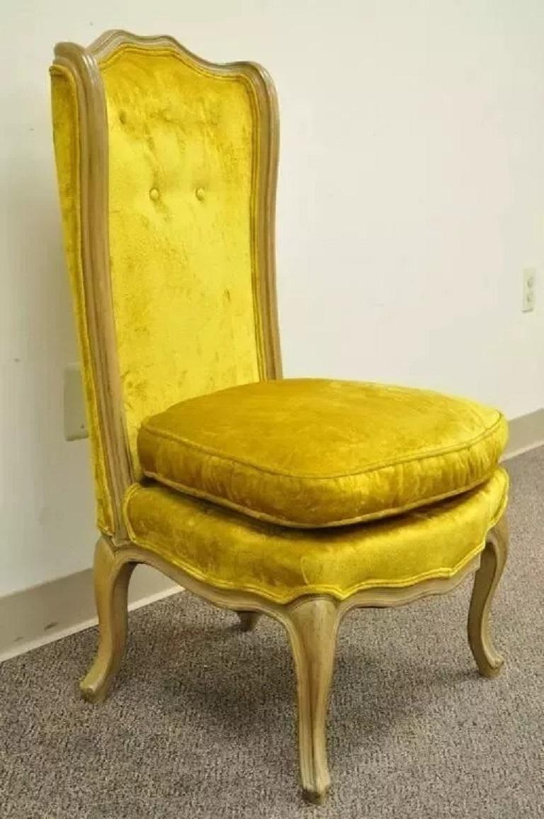 French Louis XV Provincial Style Yellow Boudoir Curved Back Slipper Chair. Item features a nicely carved solid wood frame, overstuffed loose seat cushion and classic French Louis XV form. Circa Mid 20th Century. Measurements: 38
