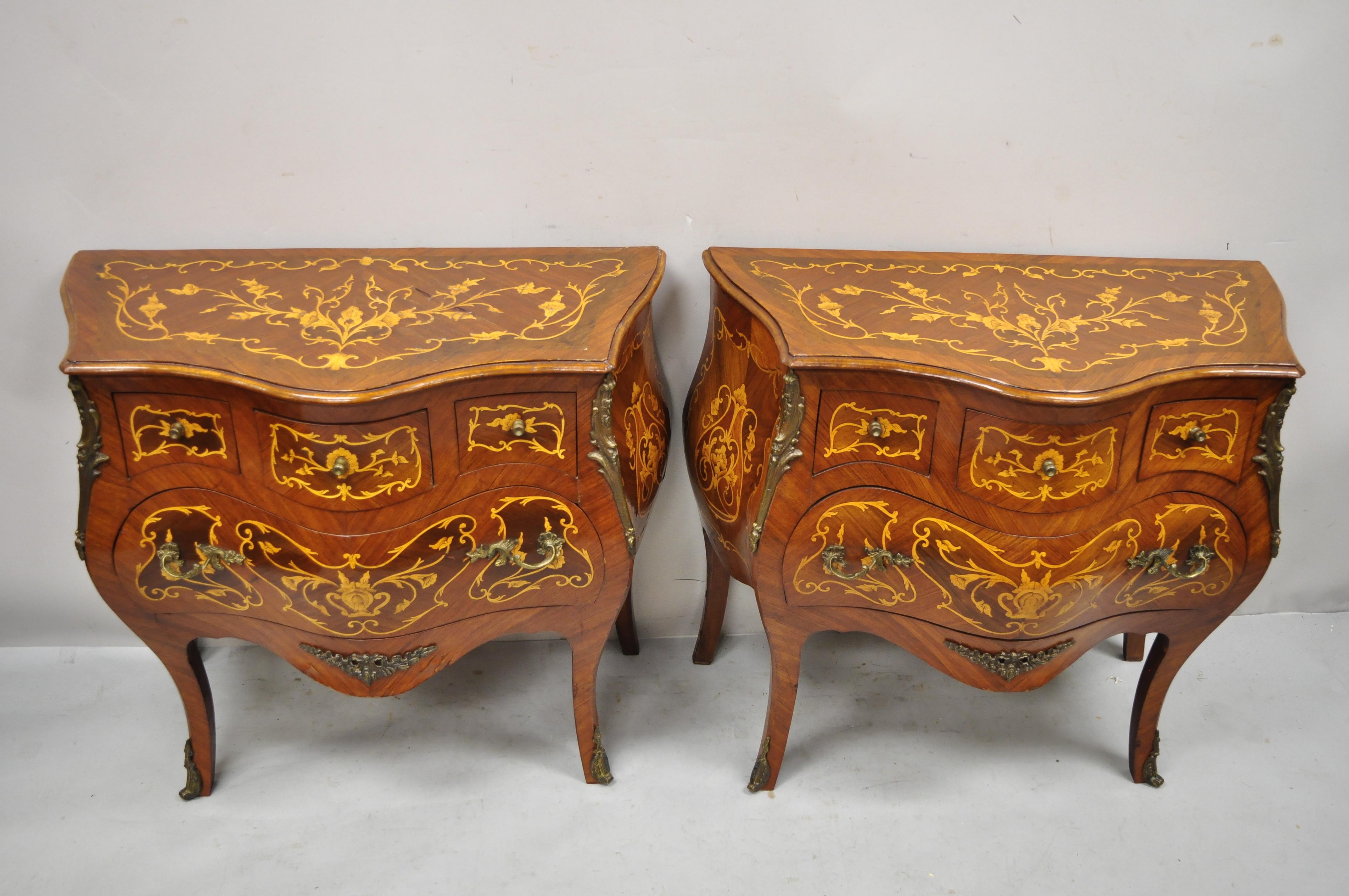 French Louis XV style Marquetry Inlay bombe commode chest bedside table - a pair. Item features bombe form, marquetry inlay throughout, 4 drawers, cabriole legs, great style and form. Circa late 20th century. Measurements: 30.5
