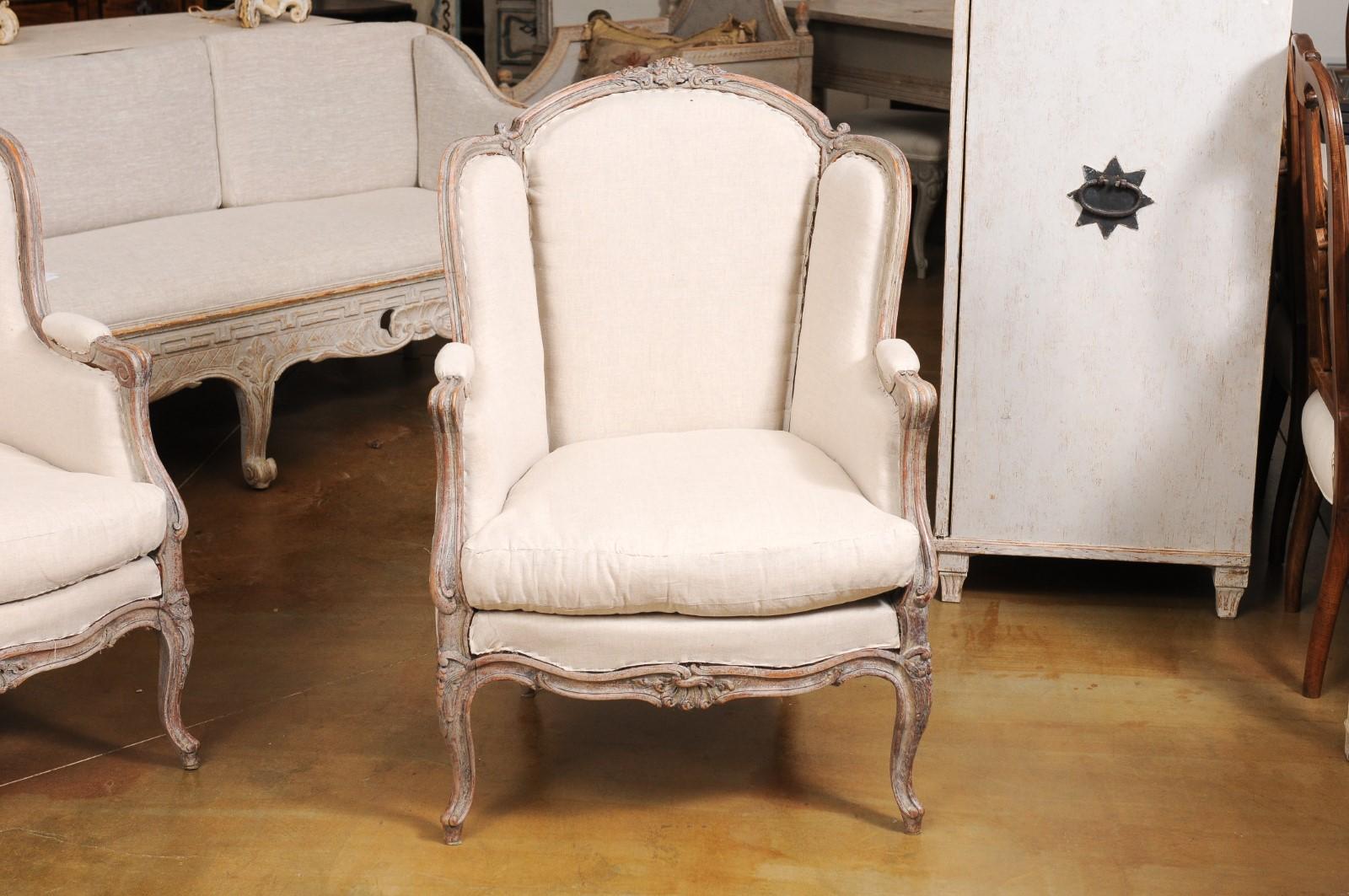 Upholstery French Louis XV Style 1880s Painted Bergère Chairs with Carved Floral Motifs For Sale