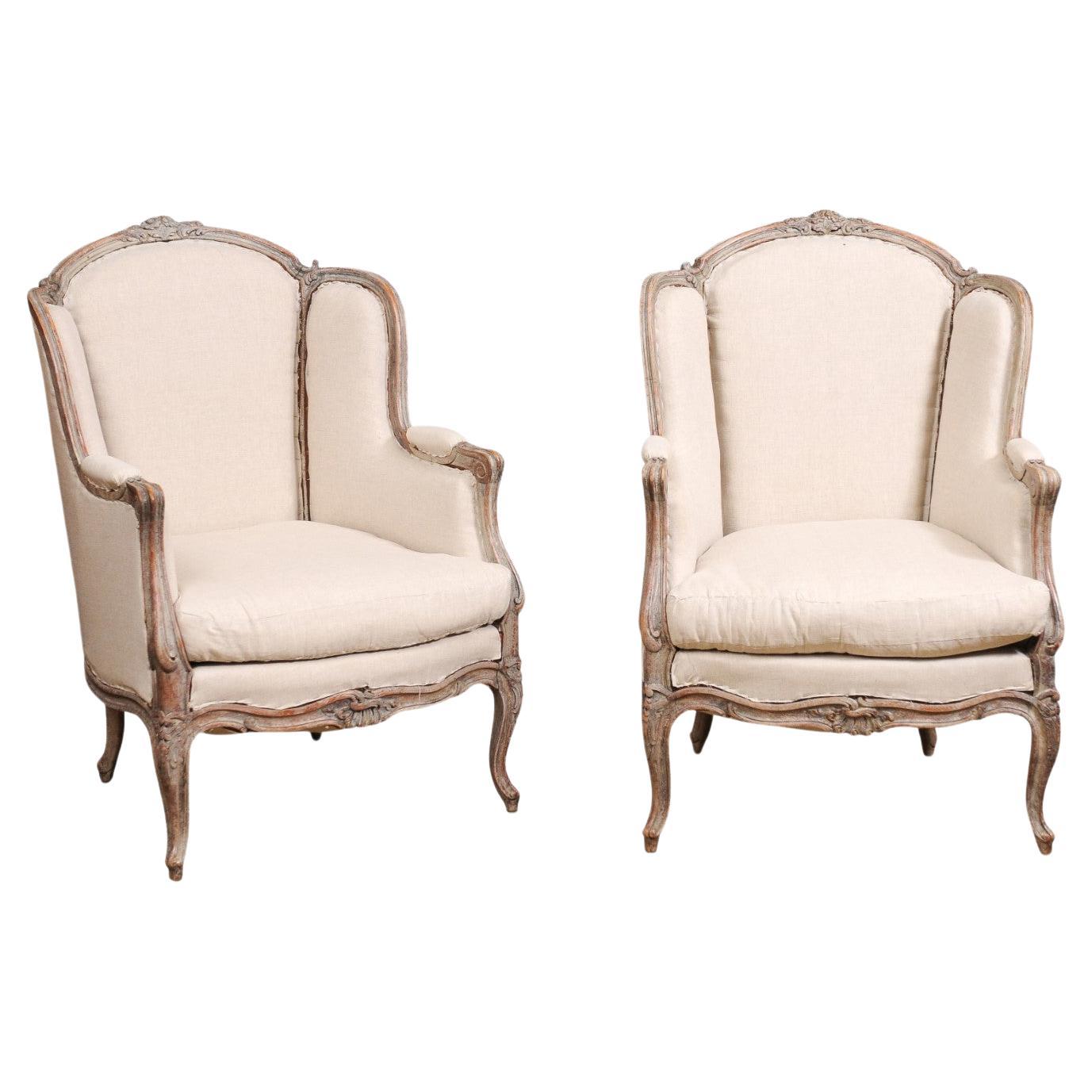 French Louis XV Style 1880s Painted Bergère Chairs with Carved Floral Motifs For Sale