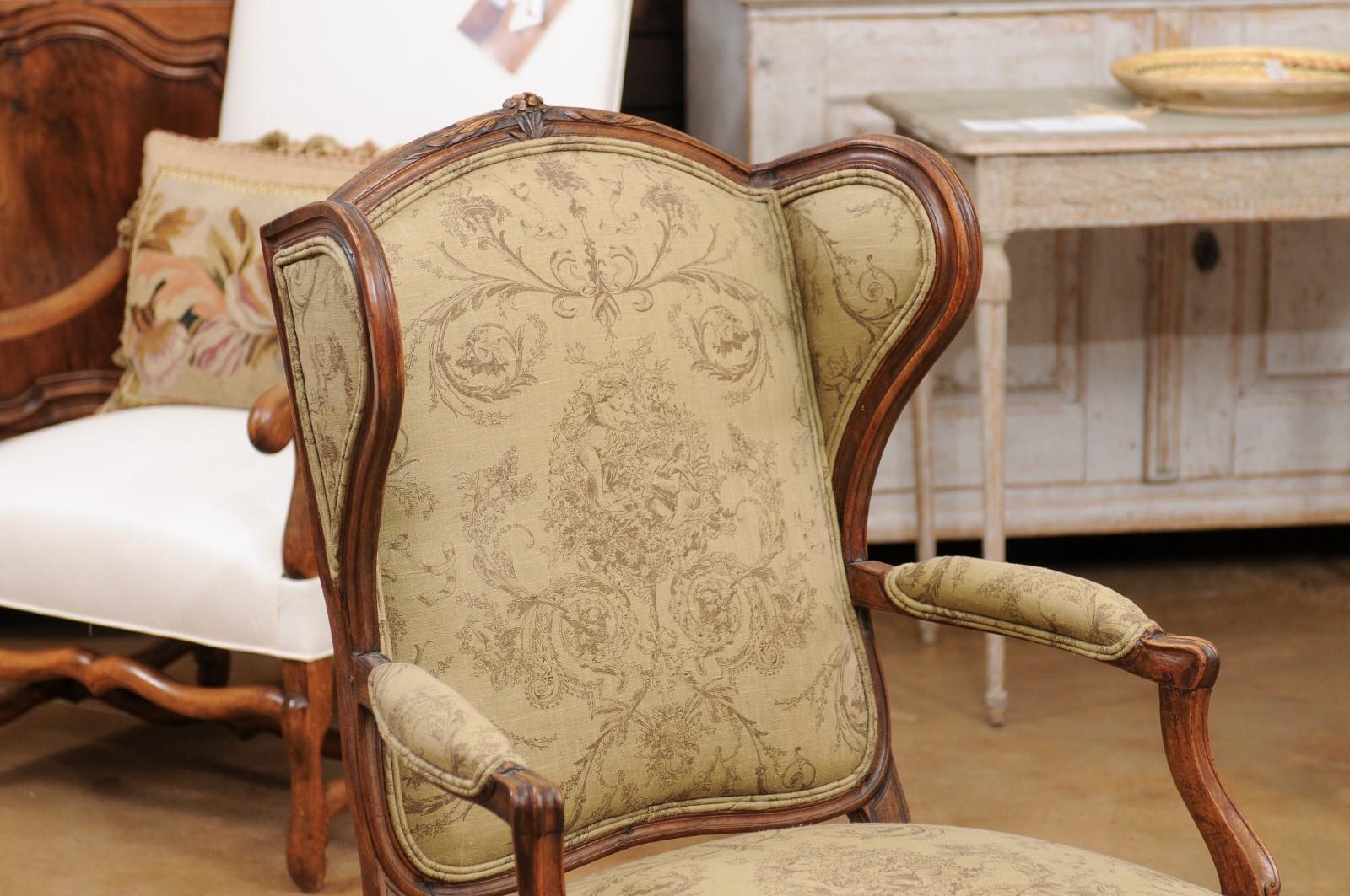 19th Century French Louis XV Style 1890s Wingback Chair with Upholstery and Carved Motifs