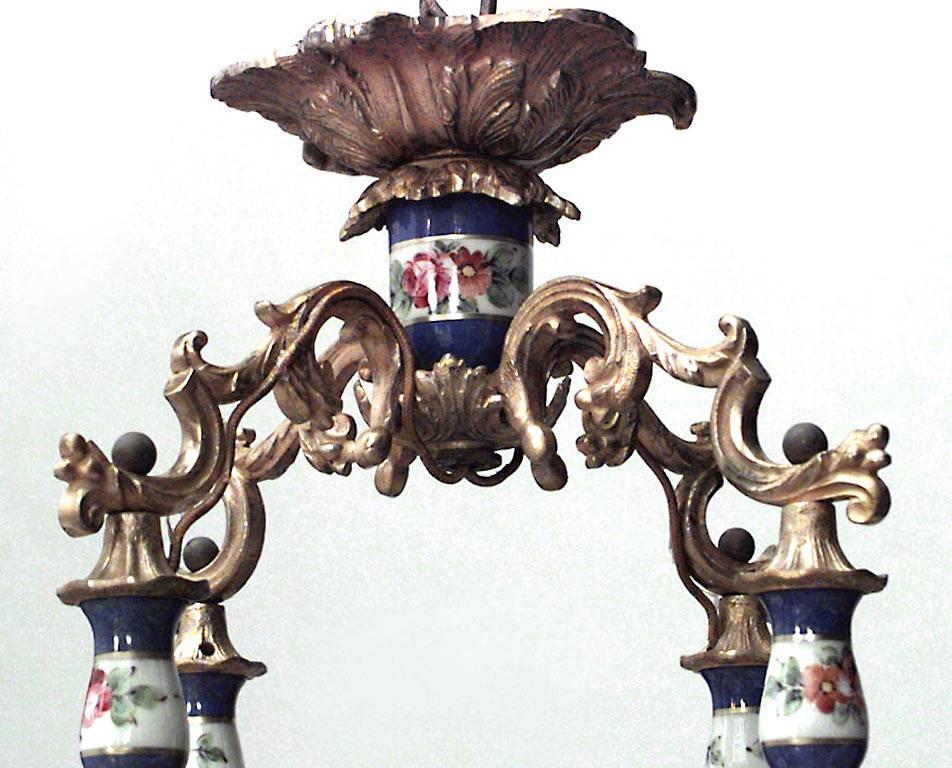 French Louis XV-style (19/20th Century) blue and white Sevres porcelain 4 arm chandelier with bronze dore trim.
