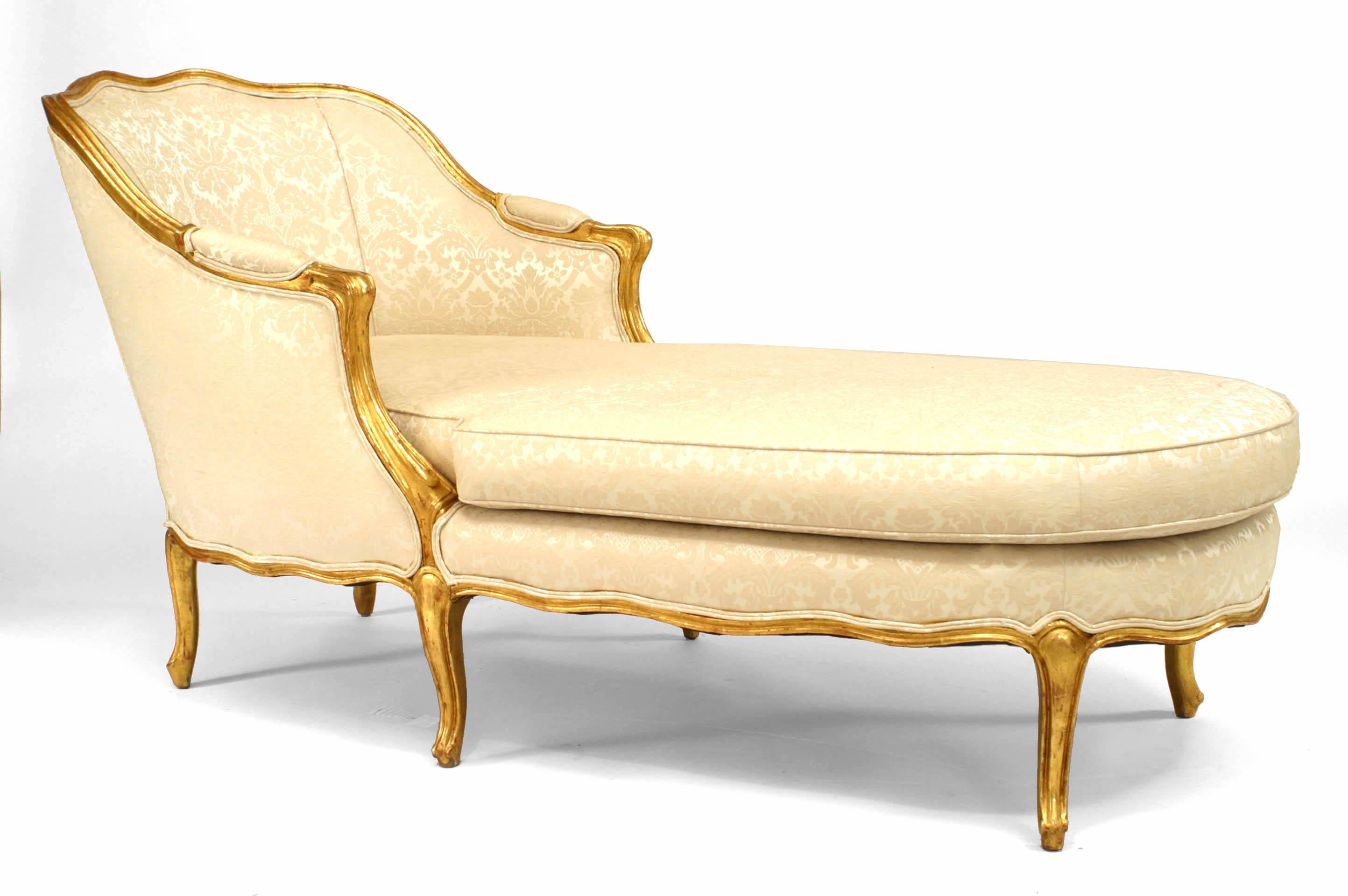 French Louis XV style '19th-20th Century' gilt chaise longue with white damask upholstery and cushion.