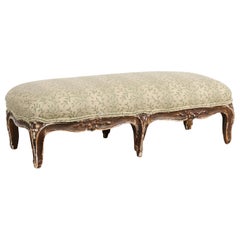 French Louis XV Style 19th Century Carved Footstool with Lightly Gilt Finish