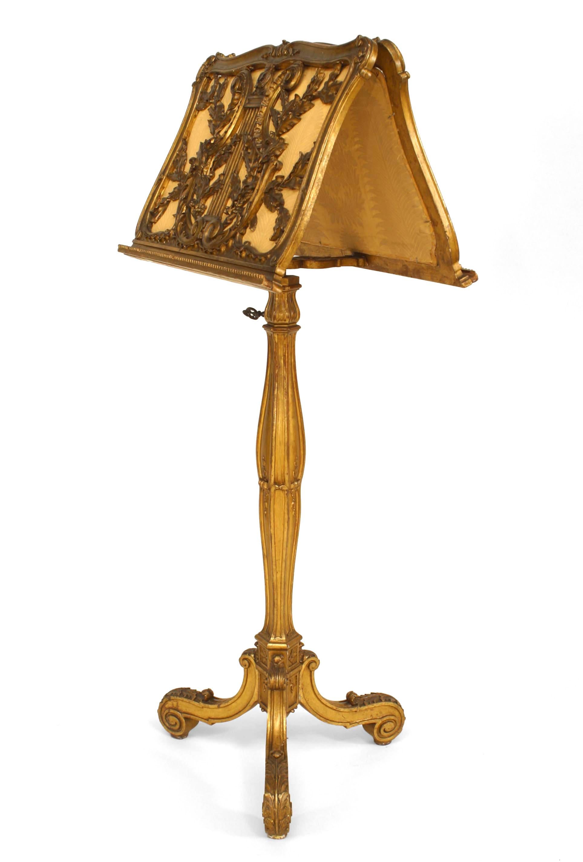 French Louis XV style (19th Cent) gilt carved adjustable pedestal base double sided (duet) music stand with lyre design.
