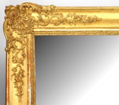 French Louis XV Style Monumental Carved Giltwood Wall Mirror