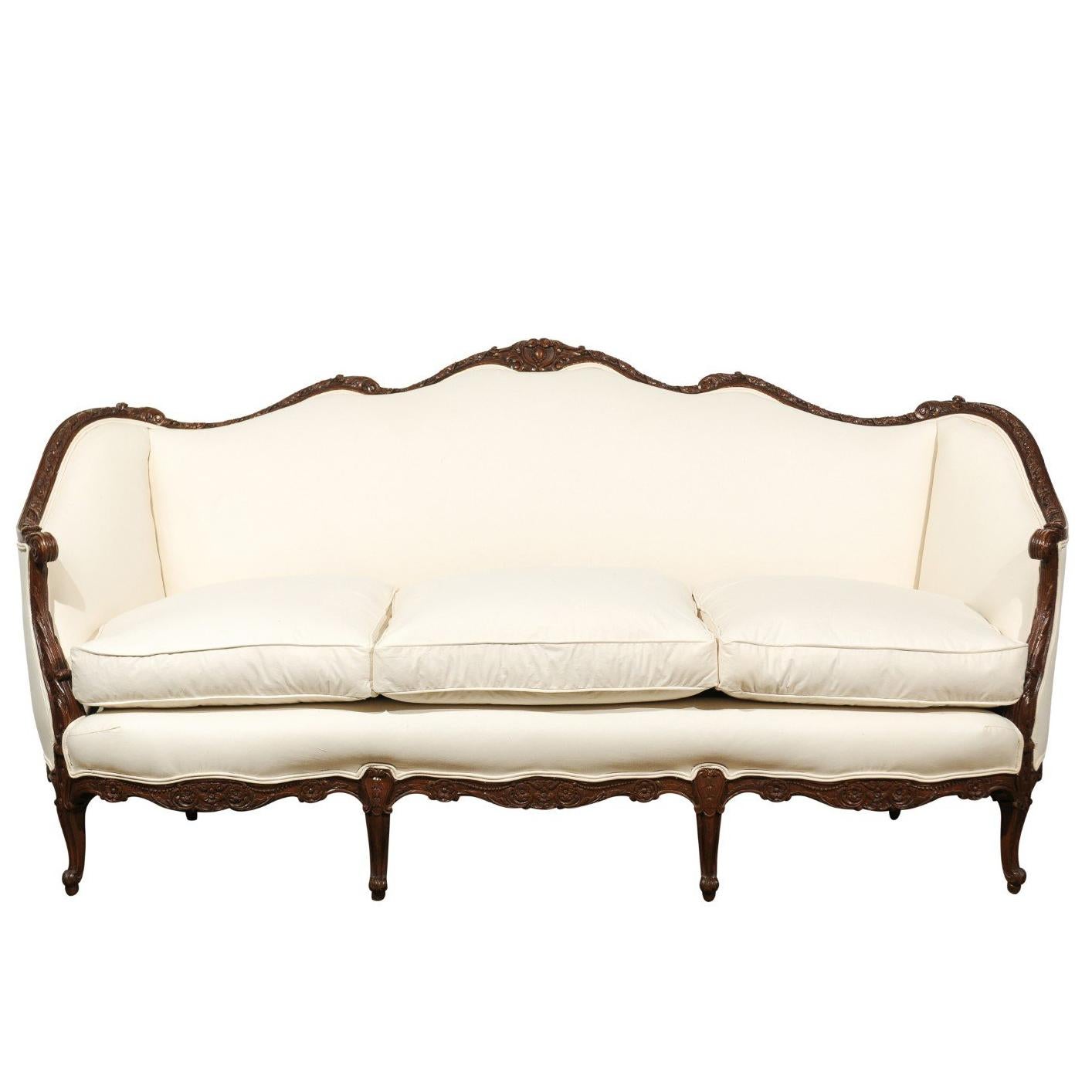 French Louis XV Style 19th Century Hand-Carved Walnut Canapé with New Upholstery