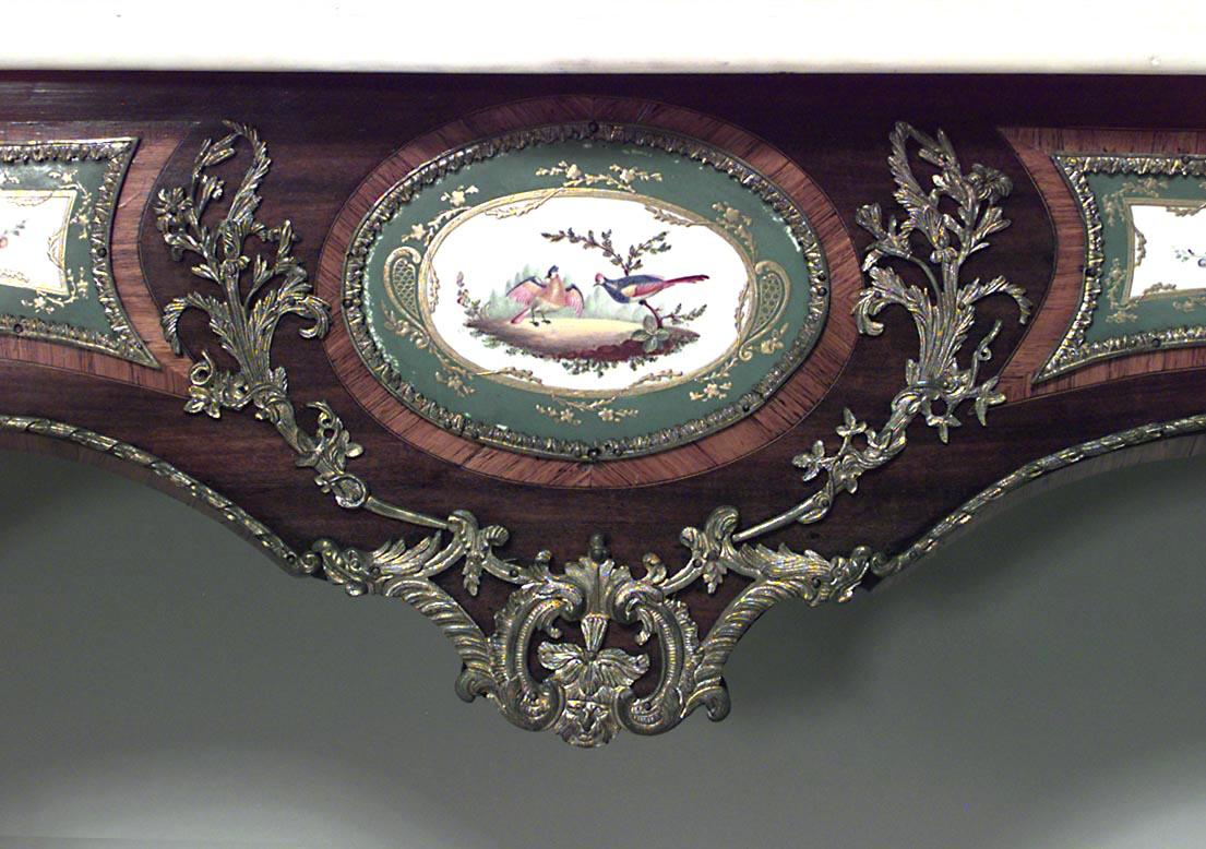 French Louis XV style (19th century) kingwood and bronze trimmed bracket console table with Sèvres Porcelain plaques and white marble top.
 