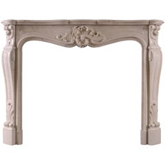 Cheminée ancienne française de style Louis XV