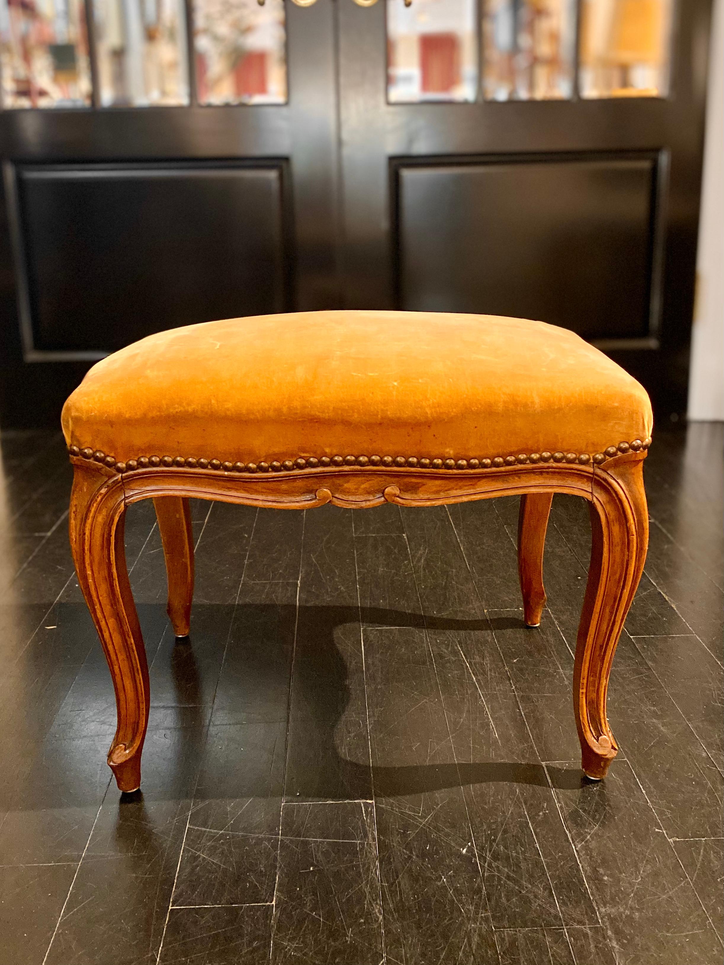 French Louis XV style bench or footstool, fawn, caramel-coloured velvet. Beautifully carved in a very classic, pure motif (my favourite). A pared-down Louis XV, more Provençal in spirit, with a clean line which only serves to enhance the beauty of